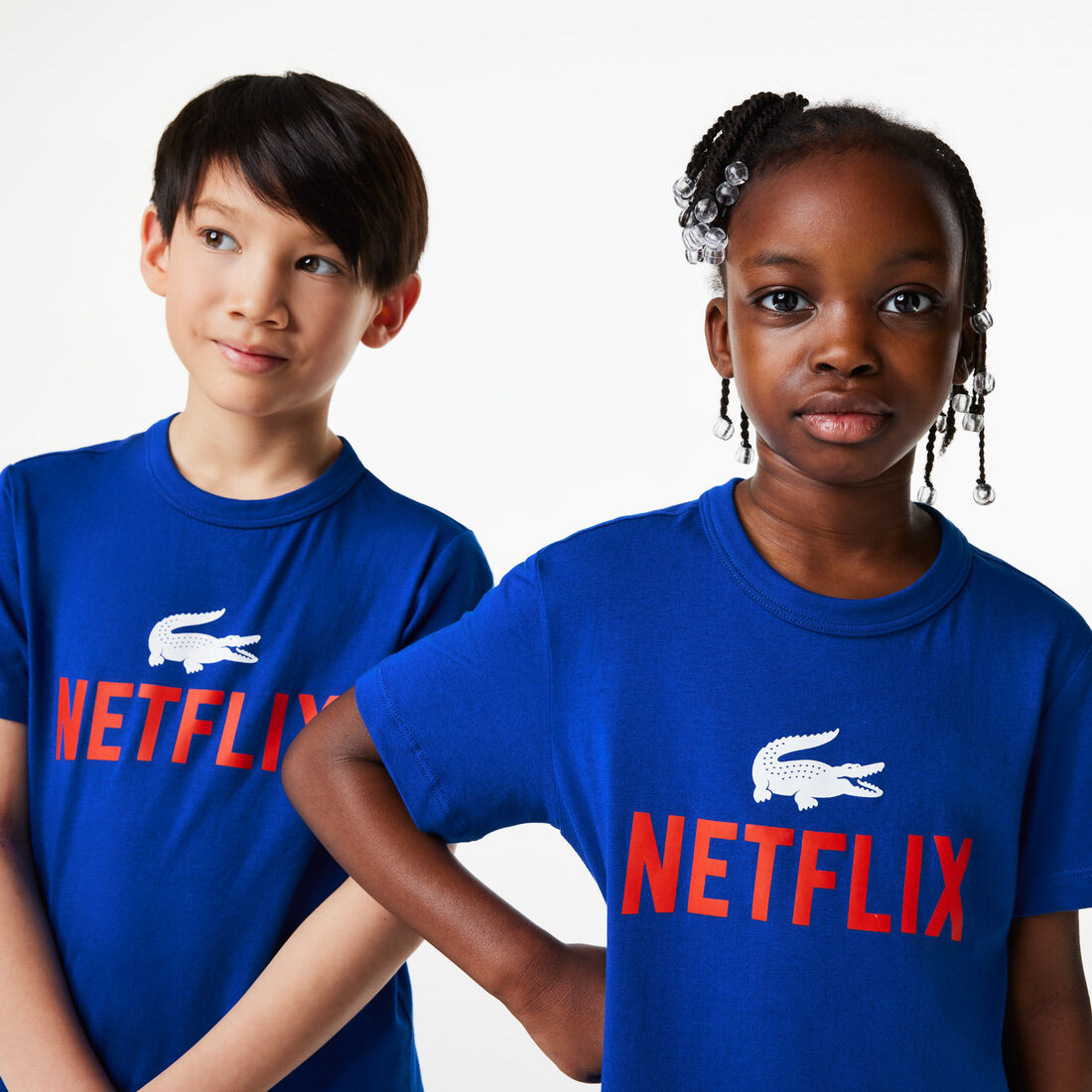 تيشيرت بطبعة قطن عضوي للأطفال مجموعة Lacoste x Netflix تيشيرت بطبعة قطن عضوي للأطفال مجموعة Lacoste x Netflix