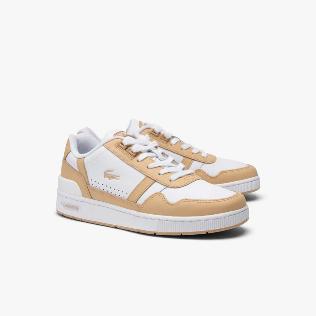 حذاء رياضي نسائي مصنوع من الجلد بلون متباين على شكل حرف T حذاء رياضي نسائي مصنوع من الجلد بلون متباين على شكل حرف T