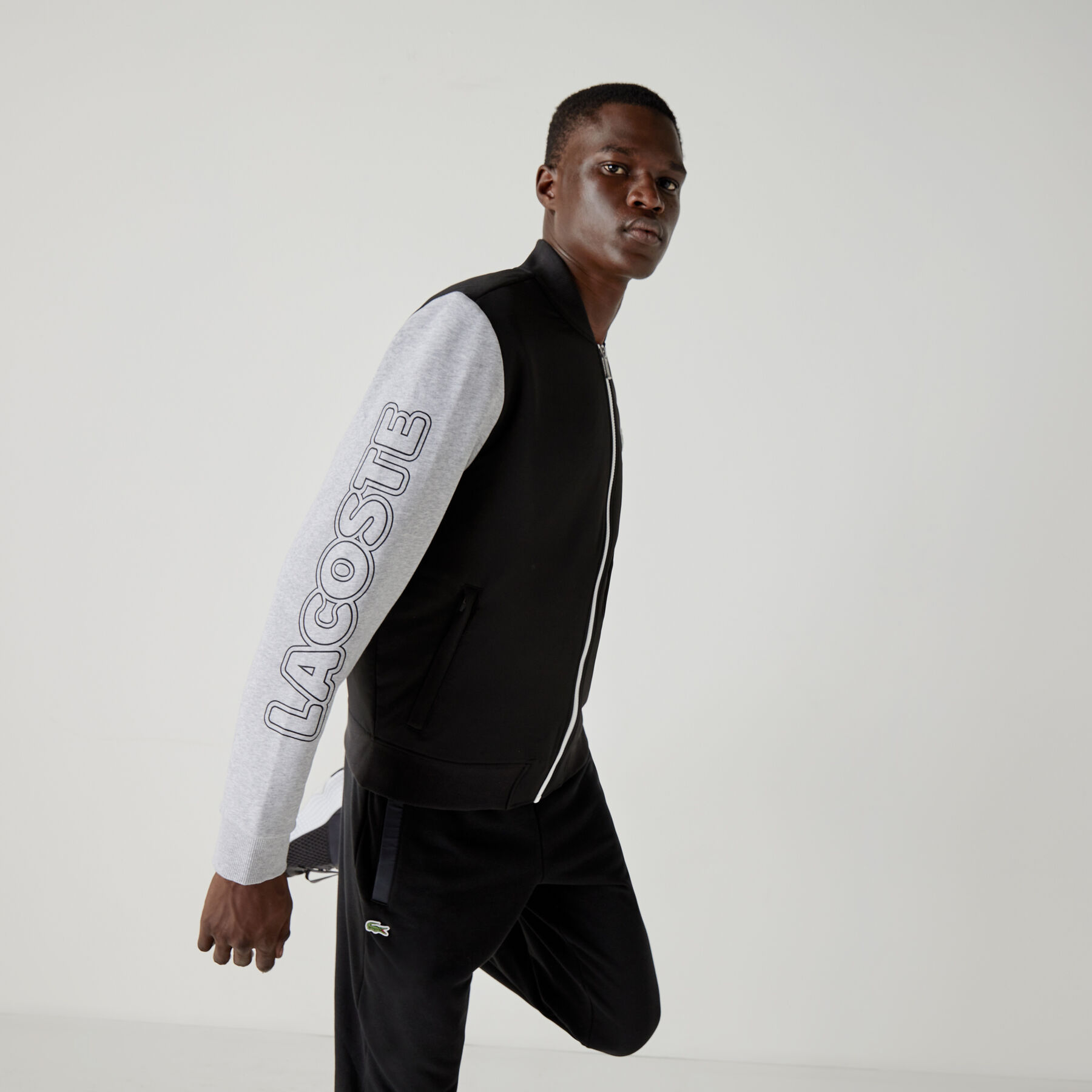 لاكوست جاكيت تيدي بسحاب من الصوف مع طبعة ثنائية اللون للرجال من مجموعة lacoste sport