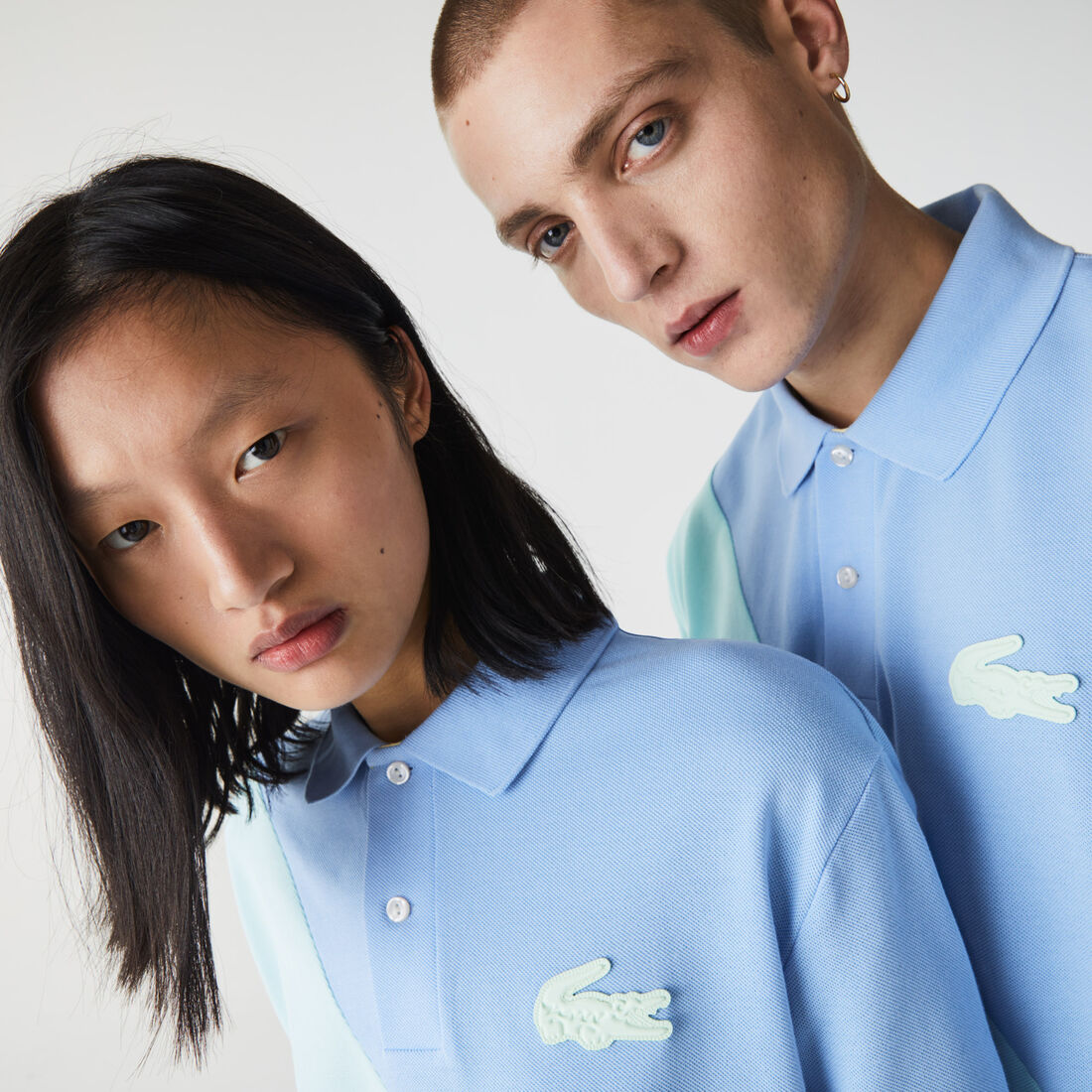 قميص بولو بيكيه القطن للجنسين بقصة فضفاضة وكتل لونية مجموعة Lacoste LIVE قميص بولو بيكيه القطن للجنسين بقصة فضفاضة وكتل لونية مجموعة Lacoste LIVE