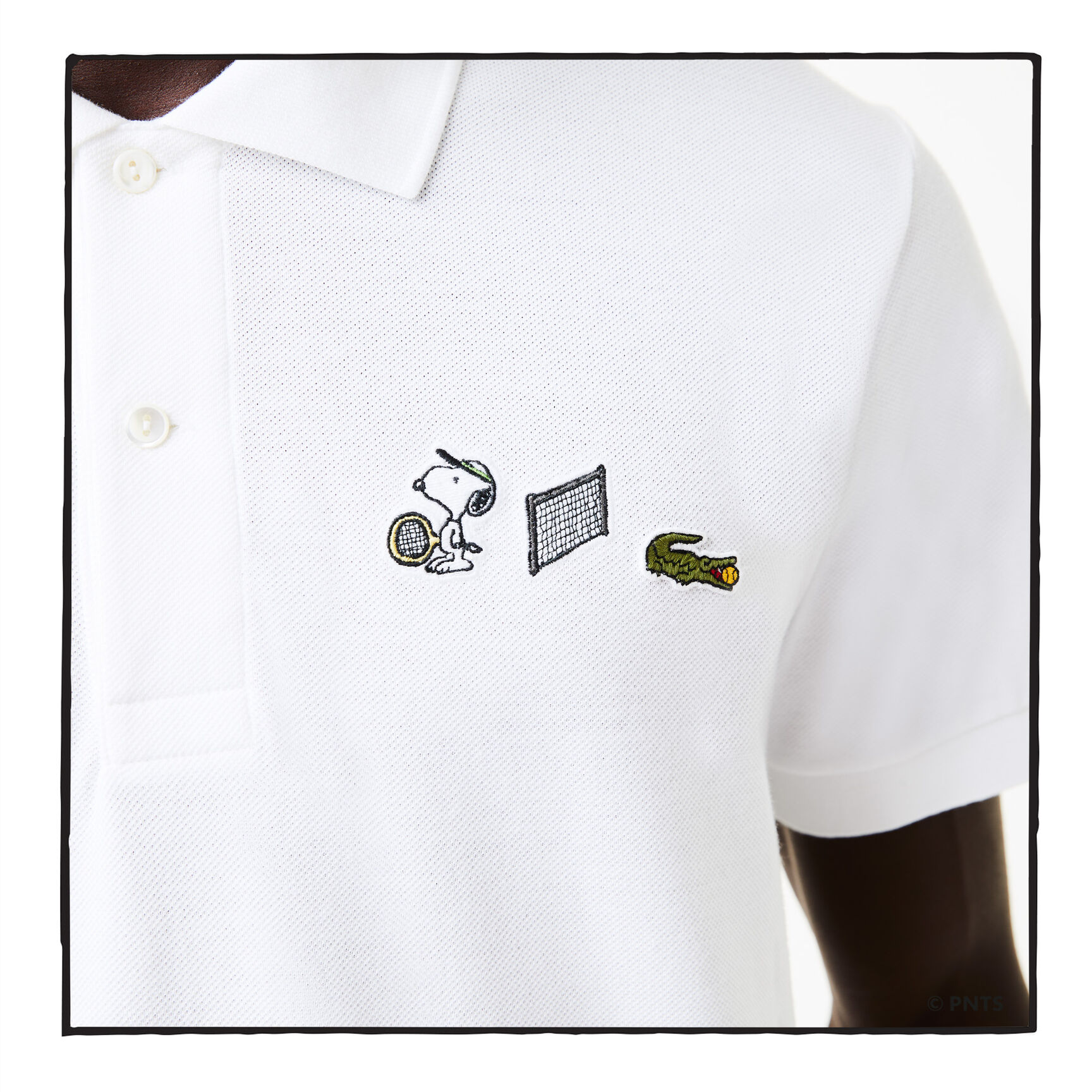 قميص بولو من القطن العضوي الرجالي من مجموعة Lacoste x Peanuts قميص بولو من القطن العضوي الرجالي من مجموعة Lacoste x Peanuts