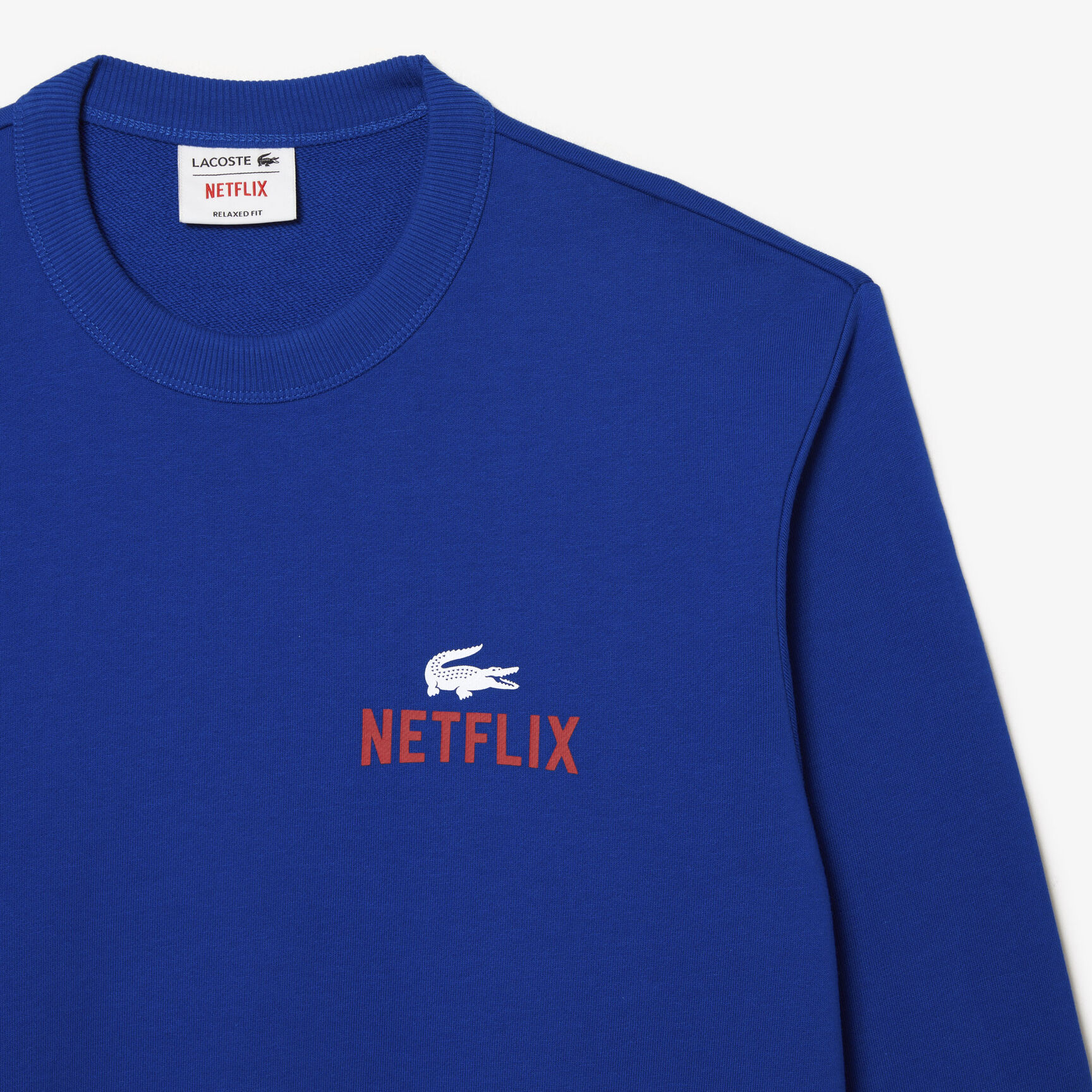 سويت شيرت بفتحة رقبة مستديرة وطبعة في الخلف للجنسين مجموعة Lacoste x Netflix سويت شيرت بفتحة رقبة مستديرة وطبعة في الخلف للجنسين مجموعة Lacoste x Netflix