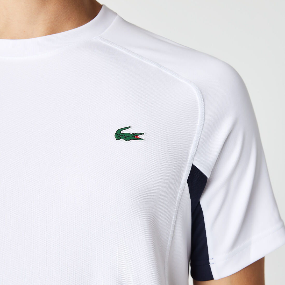 تيشيرت تنس بيكيه سريع الجفاف بتصميم مقسم بألوان للرجال مجموعة Lacoste SPORT تيشيرت تنس بيكيه سريع الجفاف بتصميم مقسم بألوان للرجال مجموعة Lacoste SPORT