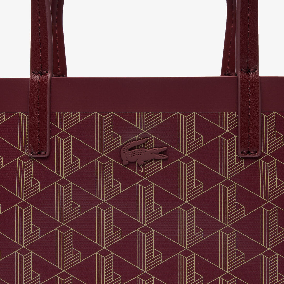 حقيبة توت صغيرة كانفا مغلفة بنقشة شعار الماركة من مجموعة زيلي حقيبة توت صغيرة كانفا مغلفة بنقشة شعار الماركة من مجموعة زيلي