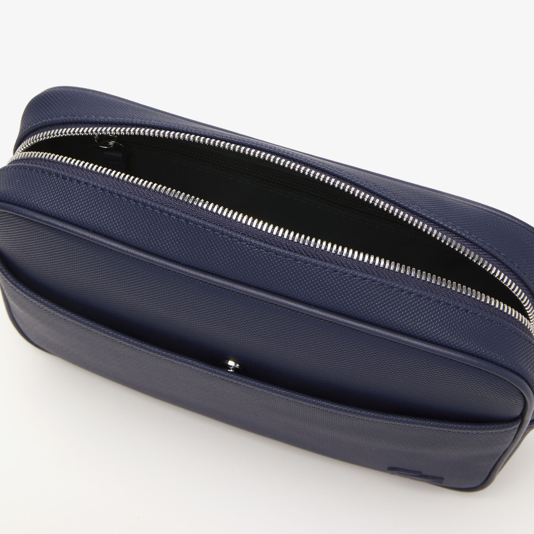 حقيبة كروس لاكوست بجيب مسطح وسحّاب للجنسين