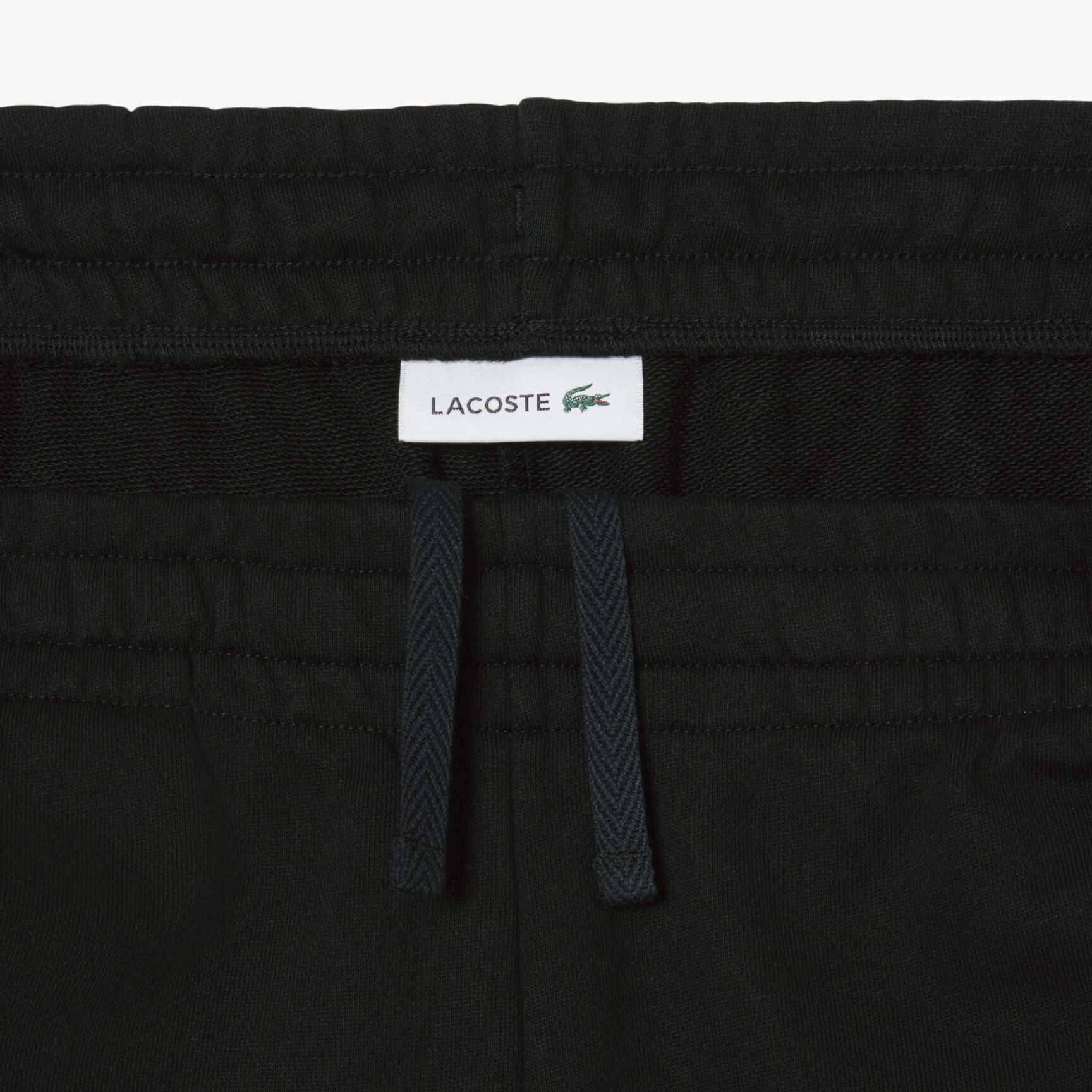 بنطال رياضي بقصّة مستقيمة وشعار الماركة بنطال رياضي بقصّة مستقيمة وشعار الماركة