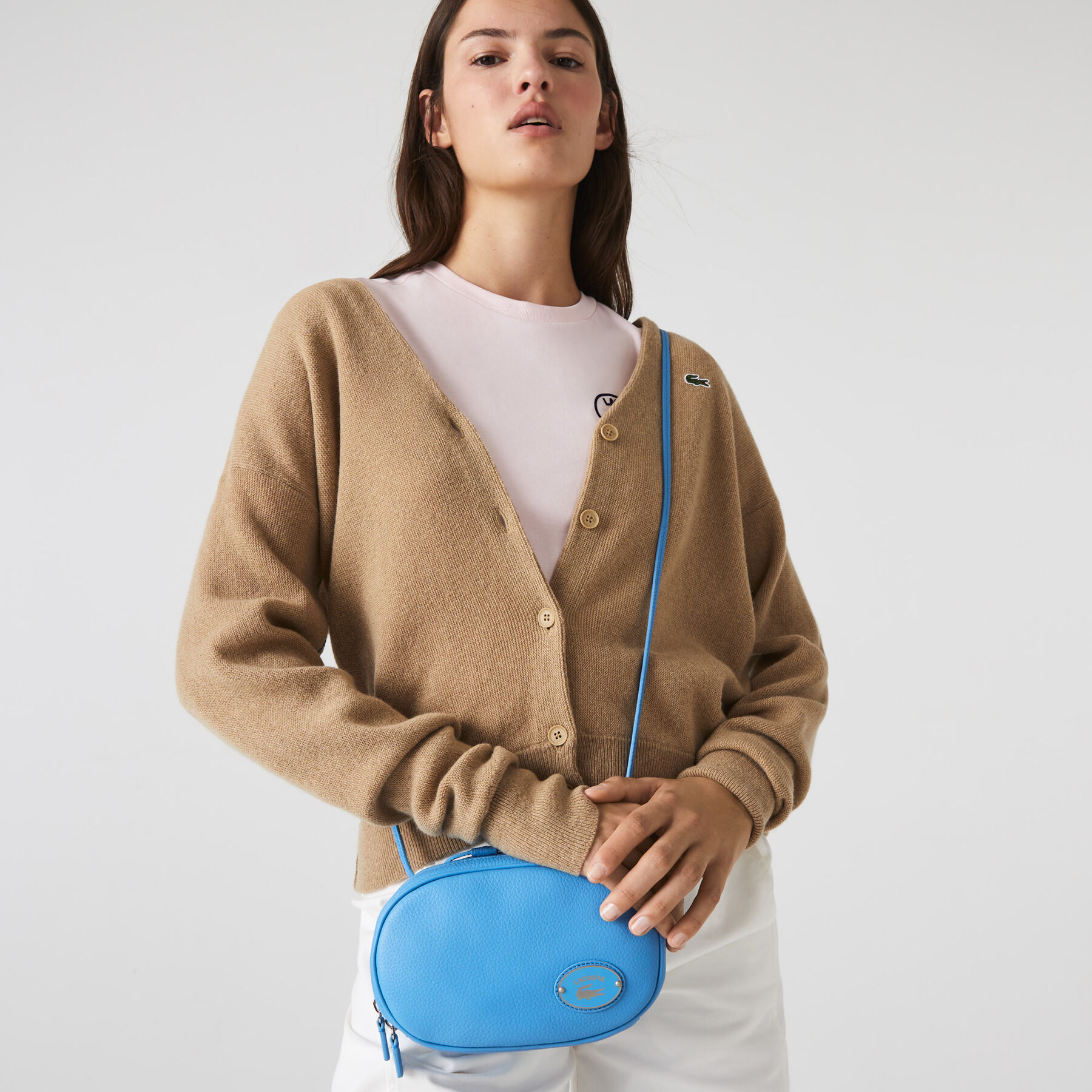 women s lacoste small oval grained leather camera bag