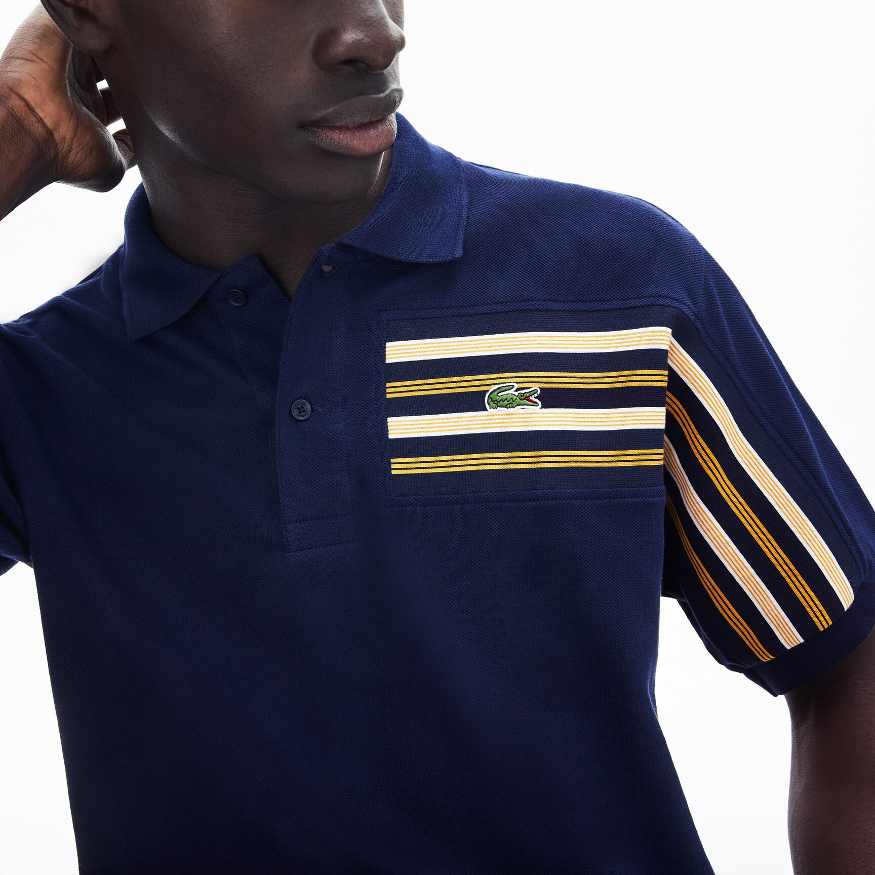 قميص بولو للرجال مقلم محيك من قطن البيكيه من مجموعة Lacoste L.12.12