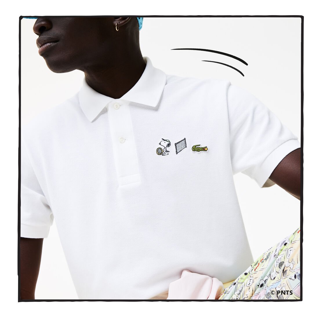 قميص بولو من القطن العضوي الرجالي من مجموعة Lacoste x Peanuts قميص بولو من القطن العضوي الرجالي من مجموعة Lacoste x Peanuts