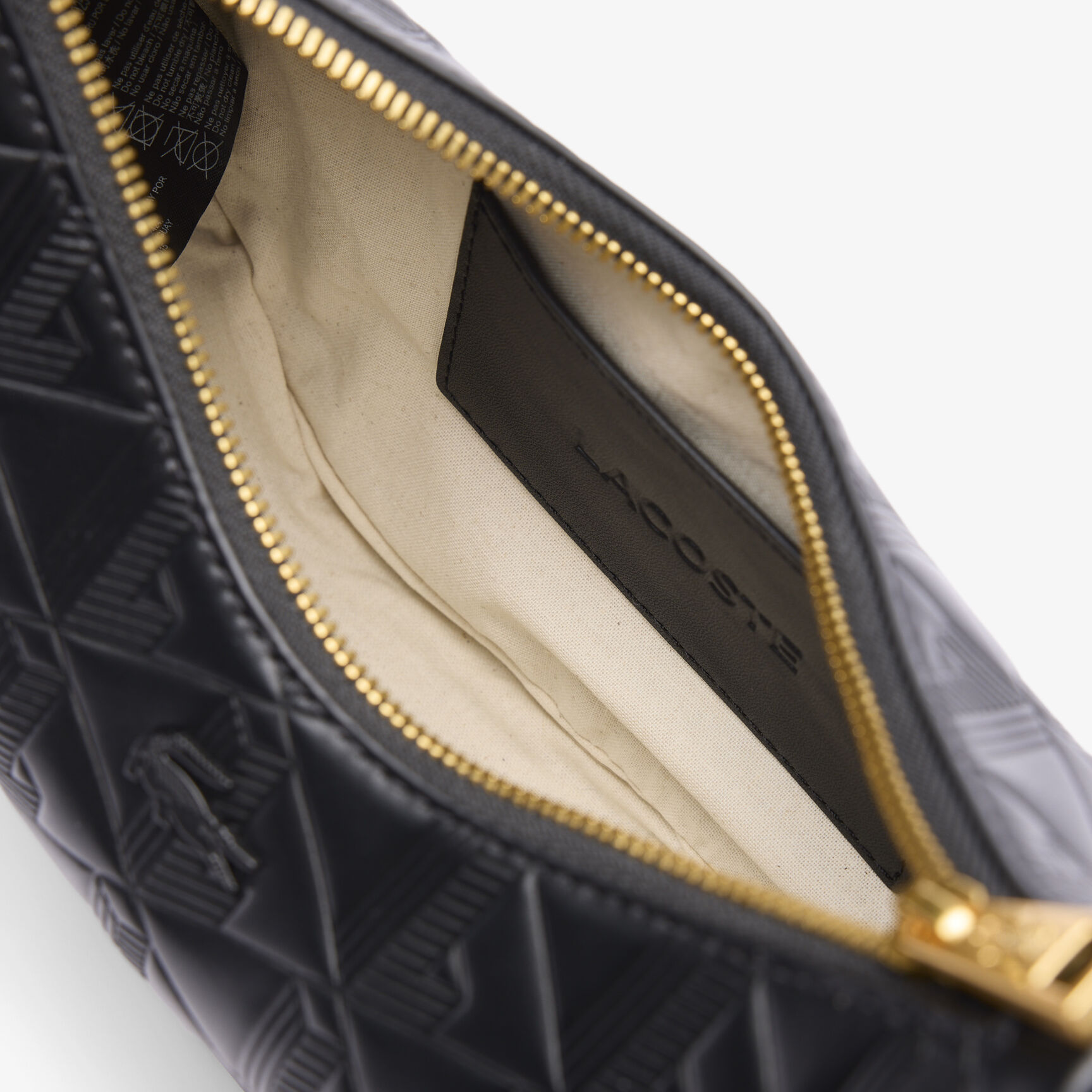 محفظة ماهيكي الجلدية المنقوشة على شكل نصف قمر