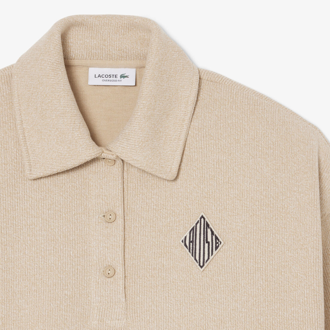 كنزة بولو مضلعة كبيرة الحجم كنزة بولو مضلعة كبيرة الحجم