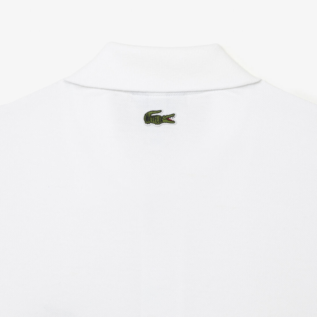 تيشيرت بولو قطن عضوي للرجال مجموعة Lacoste x Netflix تيشيرت بولو قطن عضوي للرجال مجموعة Lacoste x Netflix