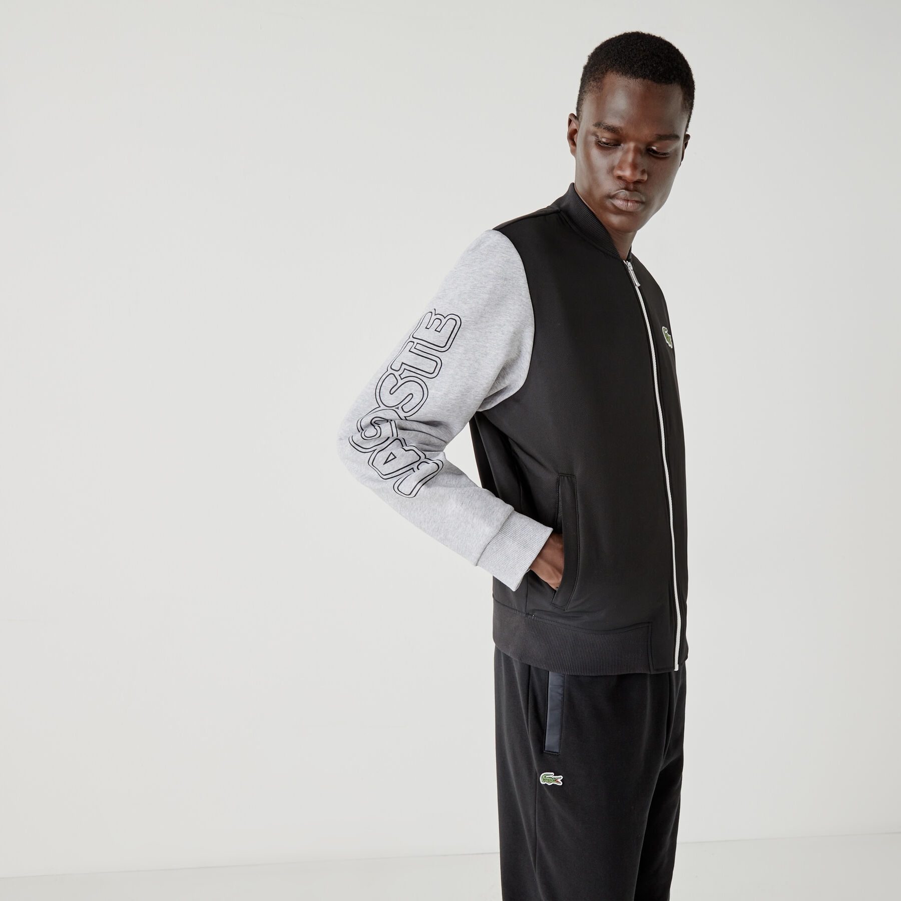 لاكوست جاكيت تيدي بسحاب من الصوف مع طبعة ثنائية اللون للرجال من مجموعة lacoste sport