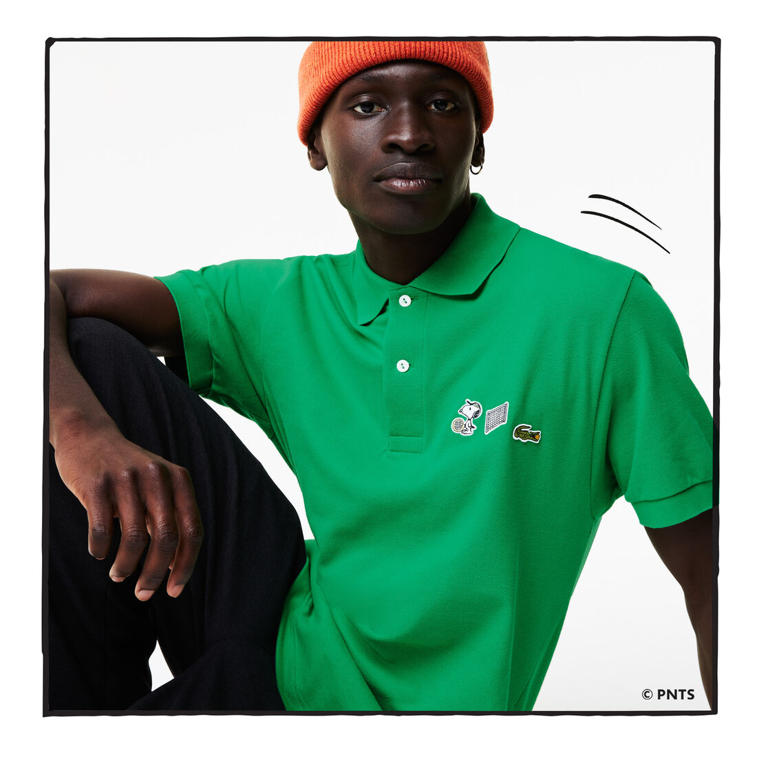 قميص بولو من القطن العضوي الرجالي من مجموعة Lacoste x Peanuts قميص بولو من القطن العضوي الرجالي من مجموعة Lacoste x Peanuts
