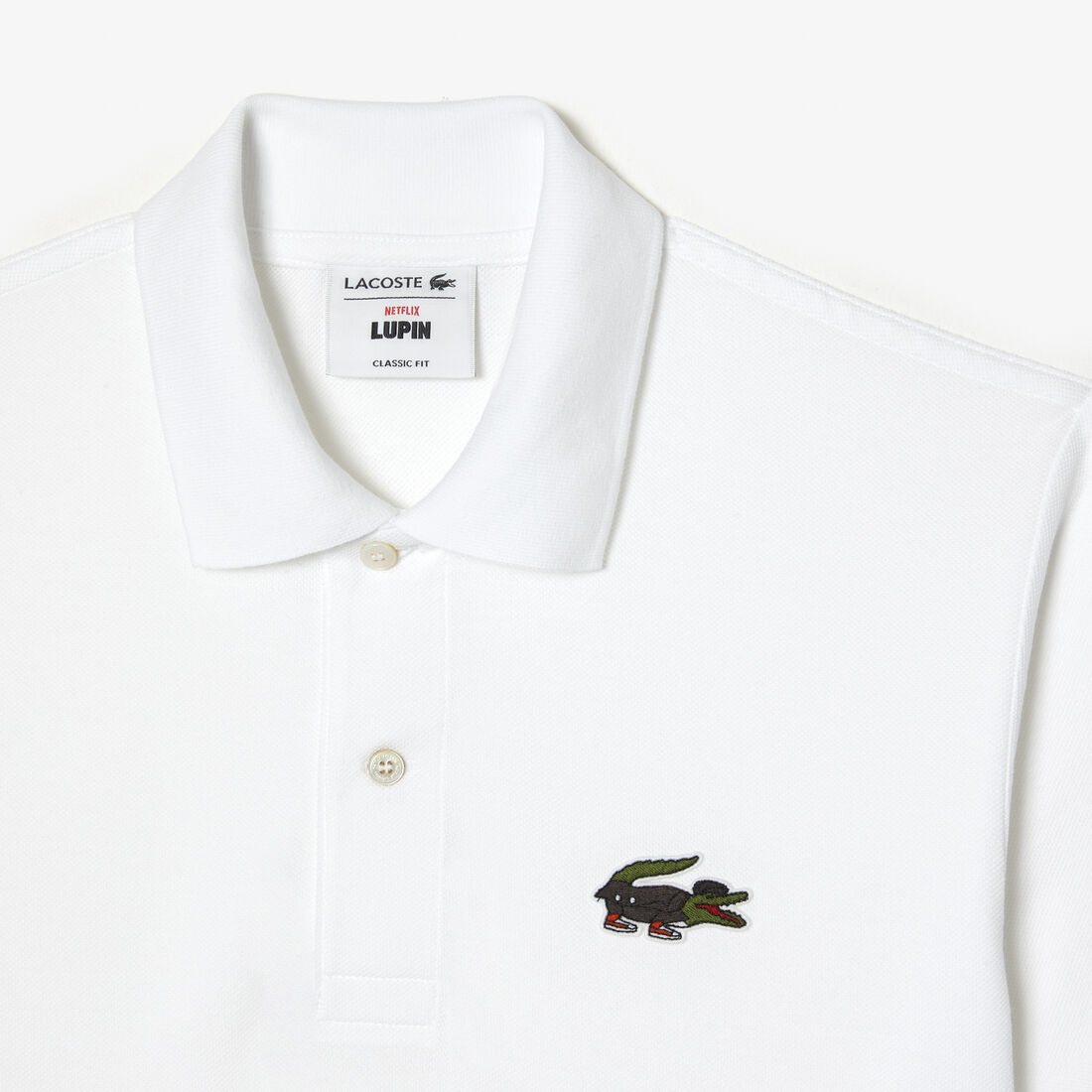 تيشيرت بولو قطن عضوي للرجال مجموعة Lacoste x Netflix تيشيرت بولو قطن عضوي للرجال مجموعة Lacoste x Netflix