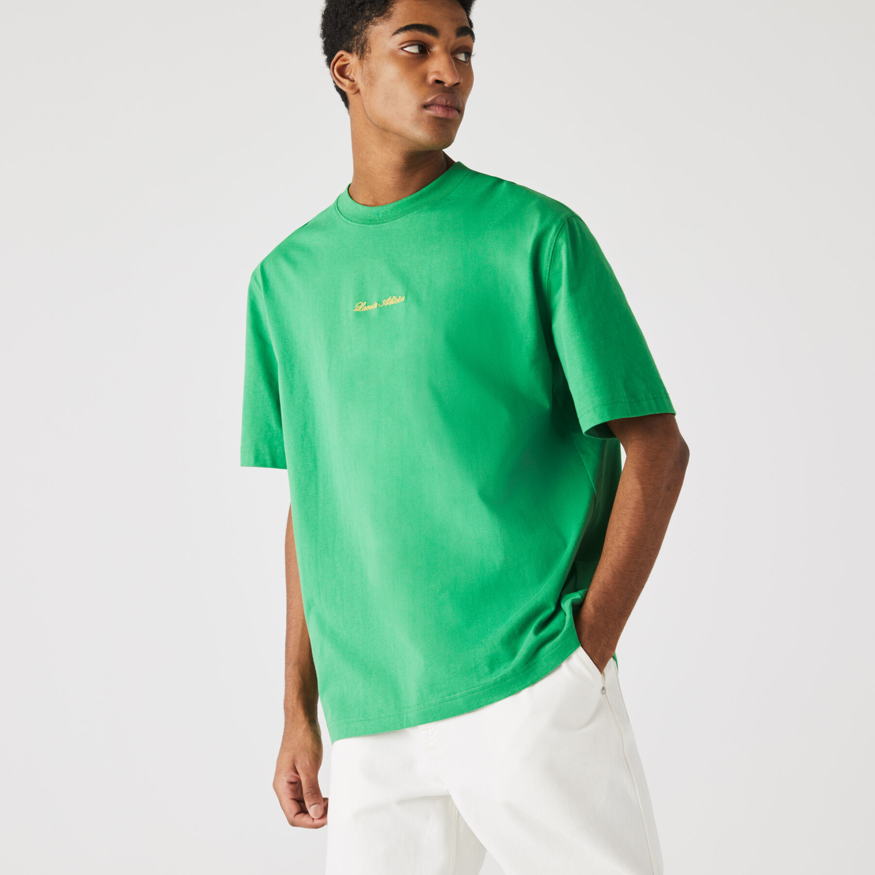 لاكوست تي شيرت قطني للجنسين قصة فضفاضة وتطريز ذهبي مجموعة lacoste live
