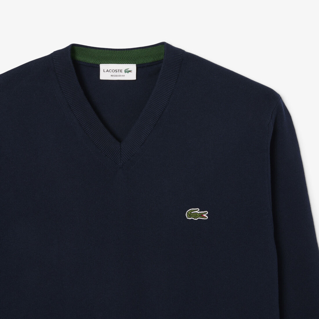 سترة قطنية أحادية اللون بفتحة رقبة على شكل حرف V سترة قطنية أحادية اللون بفتحة رقبة على شكل حرف V