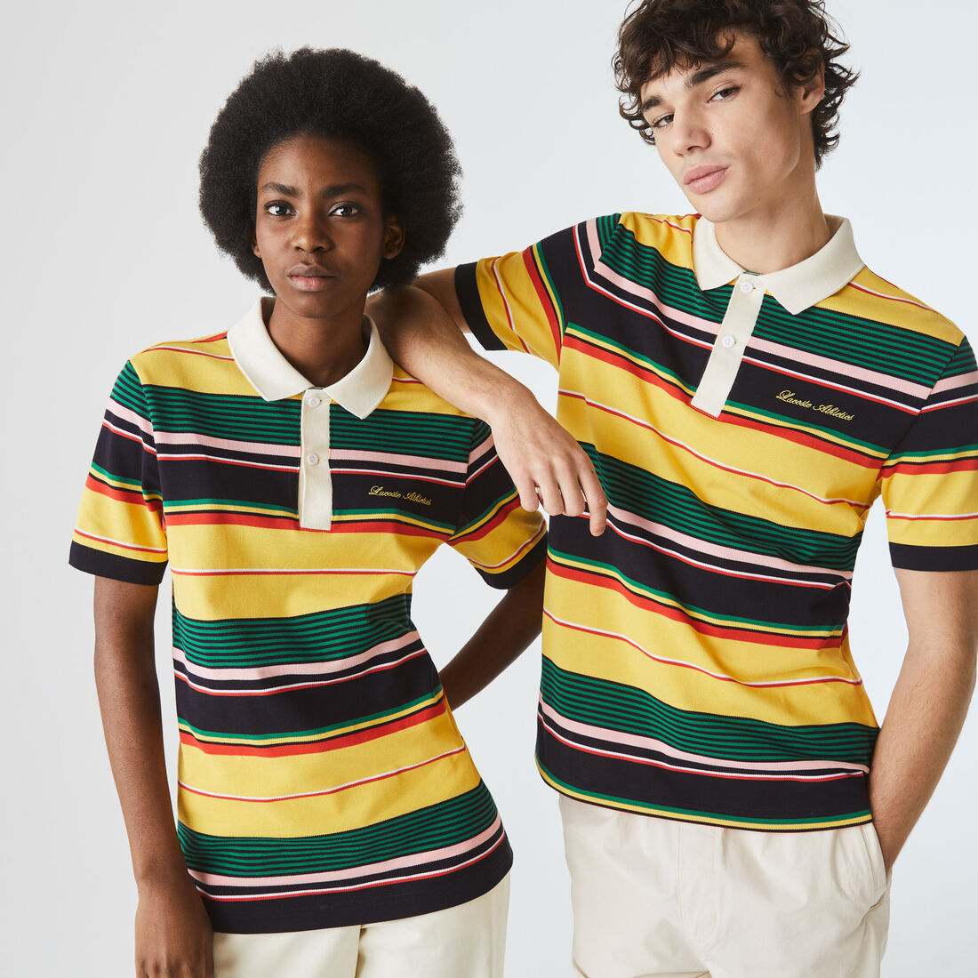 قميص بولو مقلم مطرز من بيكيه القطن مجموعة Lacoste LIVE للجنسين