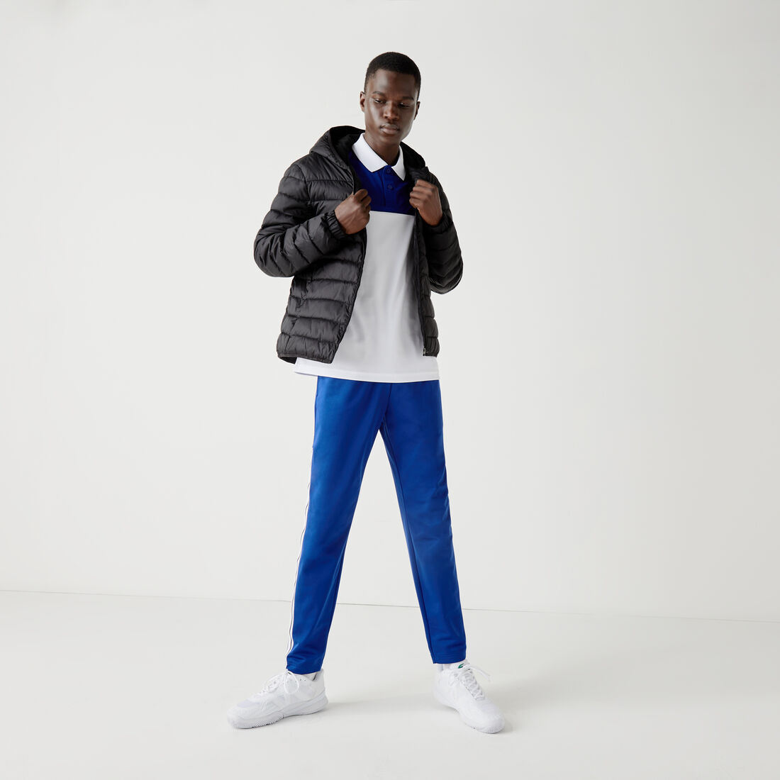 سترة مبطنة ضد الماء بغطاء رأس للرجال من مجموعة Lacoste SPORT سترة مبطنة ضد الماء بغطاء رأس للرجال من مجموعة Lacoste SPORT