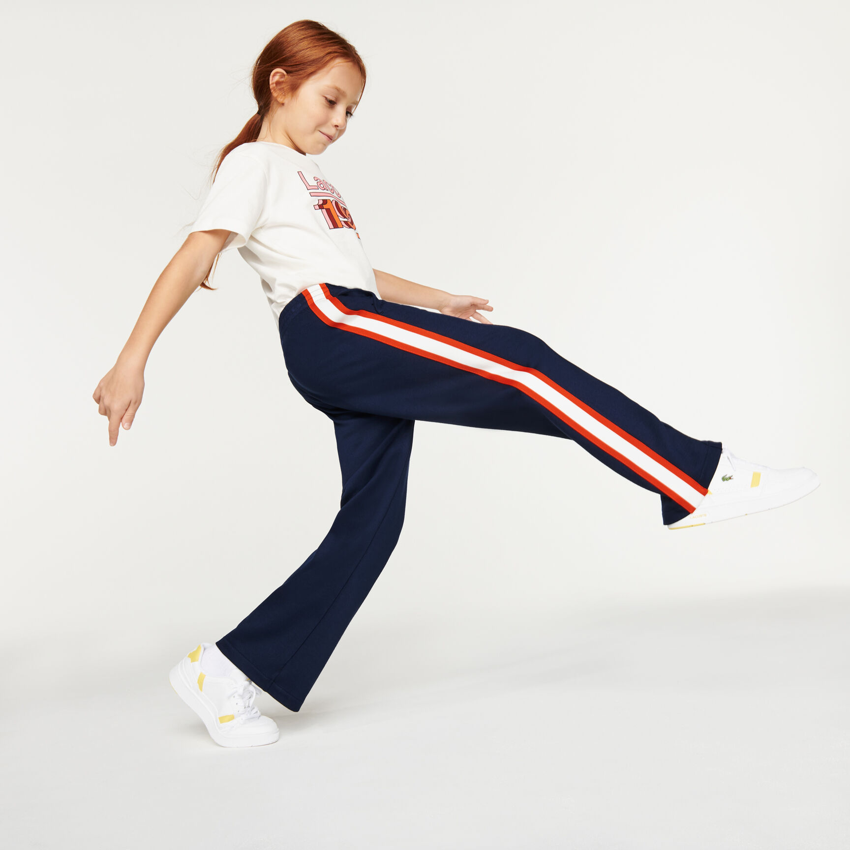 بنطلون رياضي مطاطي بشرائط متباينة للبنات بنطلون رياضي مطاطي بشرائط متباينة للبنات