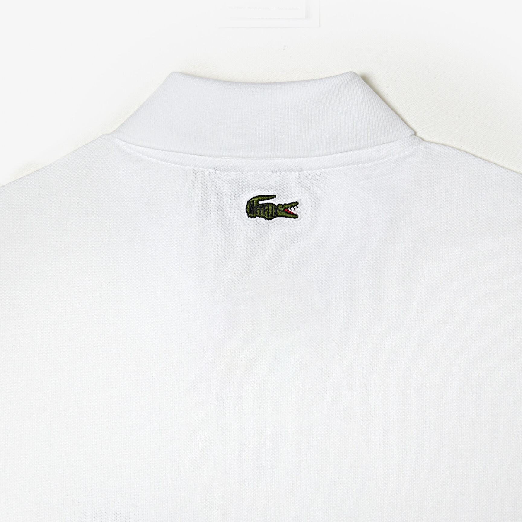 تيشيرت بولو قطن عضوي للرجال مجموعة Lacoste x Netflix