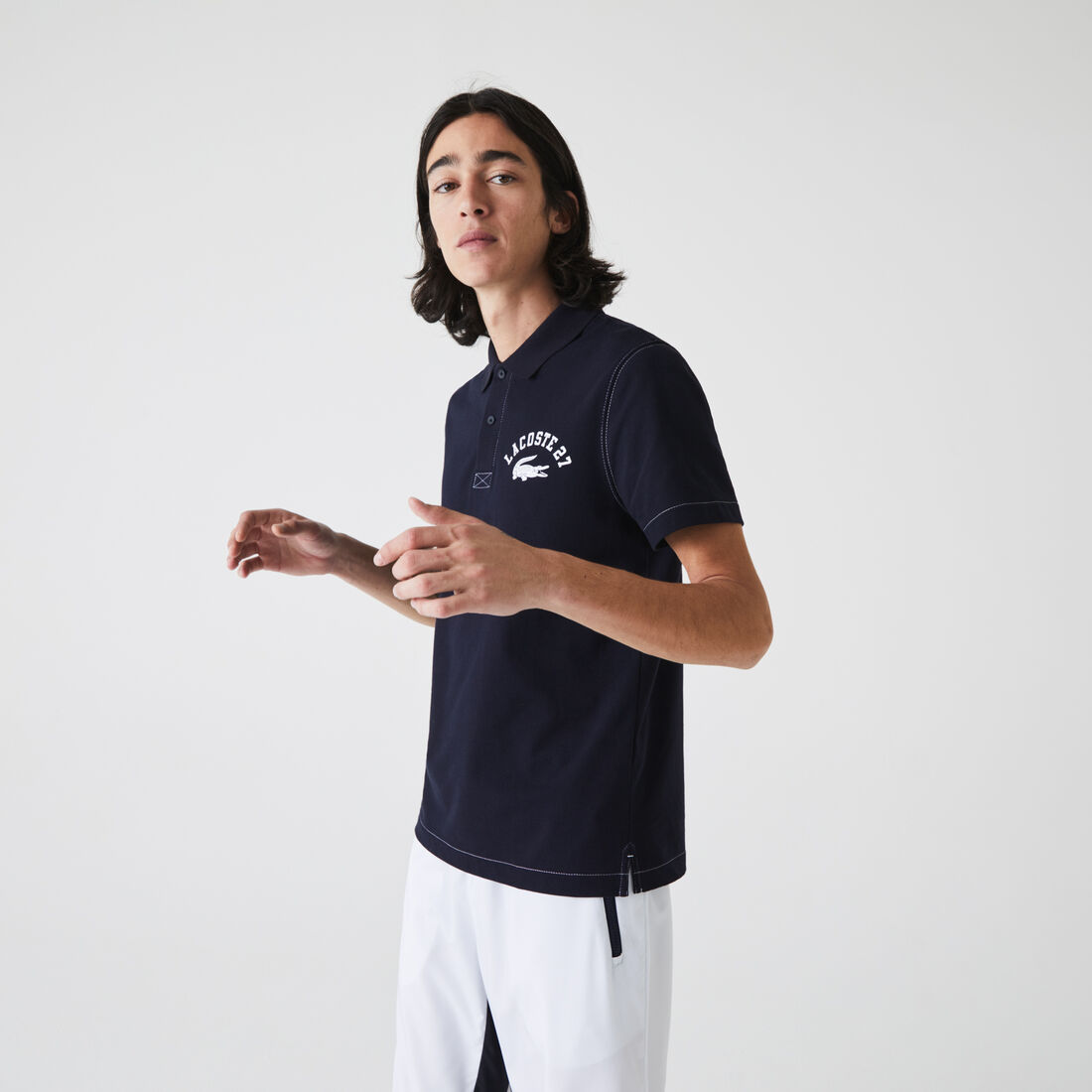Men’s Lacoste Regular Fit Lettered Ultra-Light Knit Polo Shirt Men’s Lacoste Regular Fit Lettered Ultra-Light Knit Polo Shirt