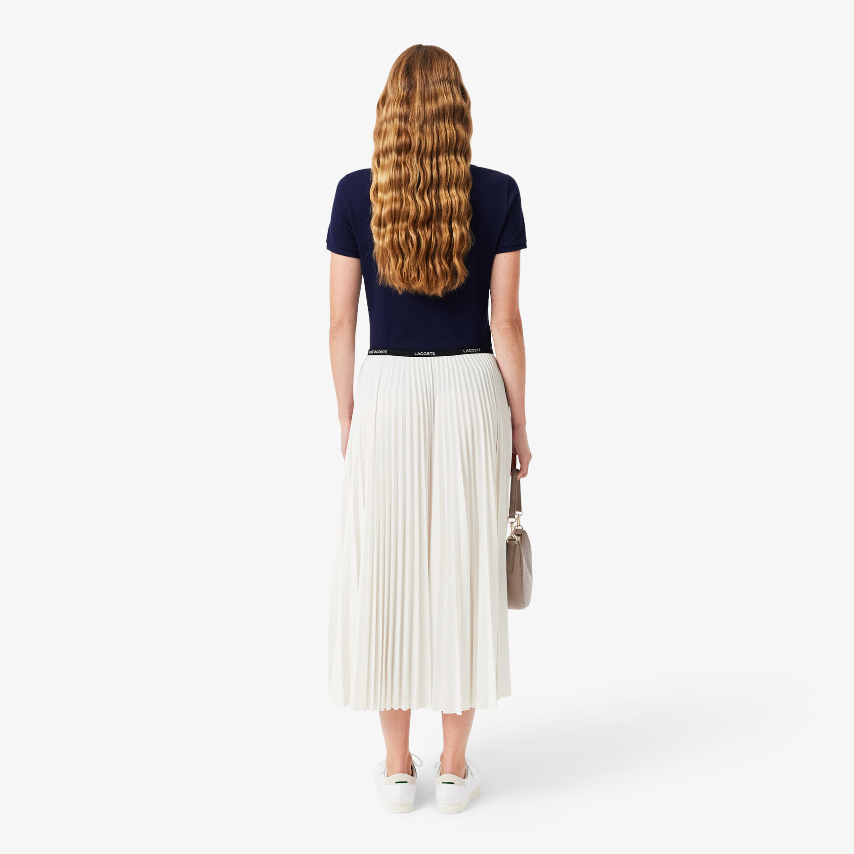 تنورة طويلة مطوية بخصر مطاطي تنورة طويلة مطوية بخصر مطاطي