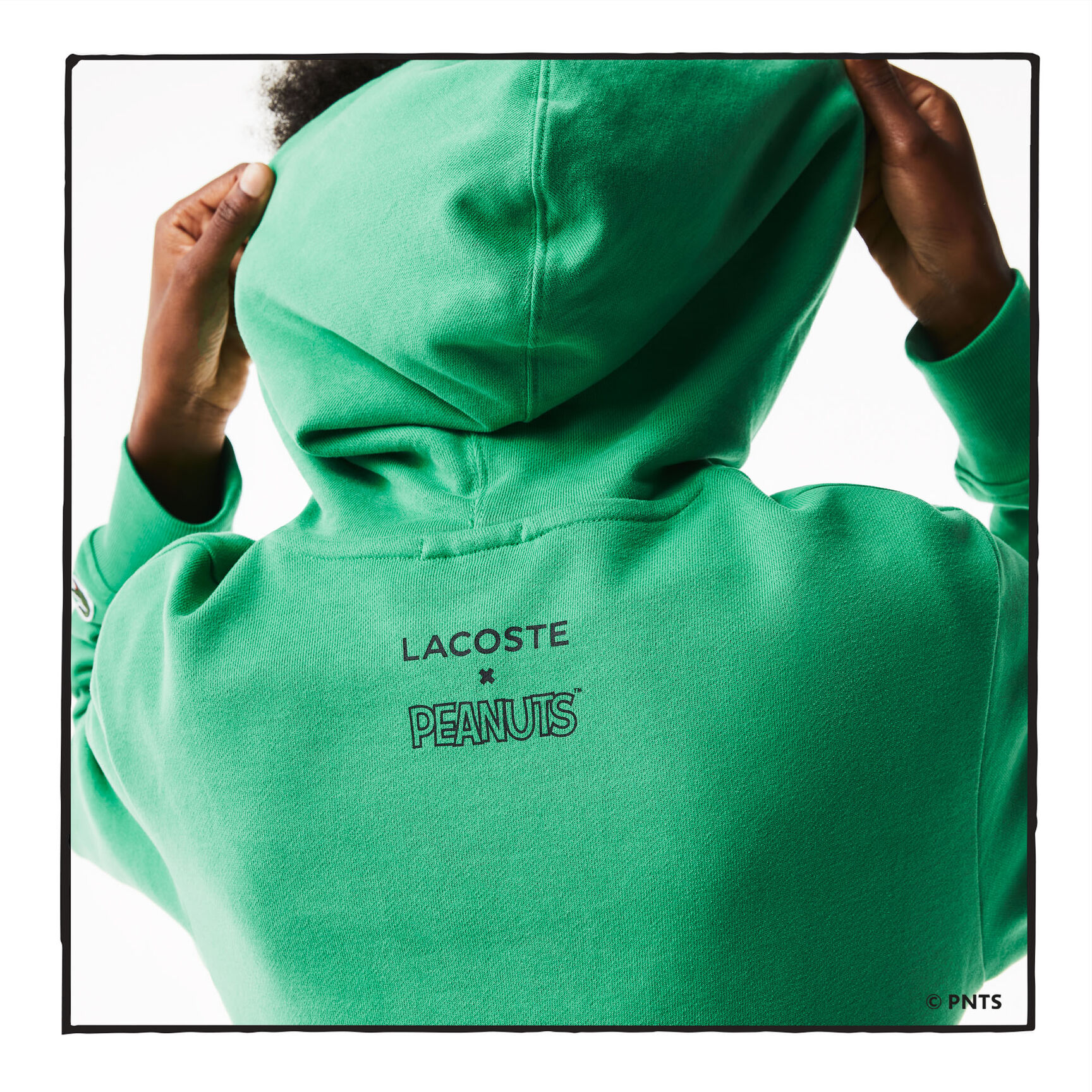 سويت شيرت من القطن العضوي بقلنسوة للجنسين من Lacoste x Peanuts سويت شيرت من القطن العضوي بقلنسوة للجنسين من Lacoste x Peanuts