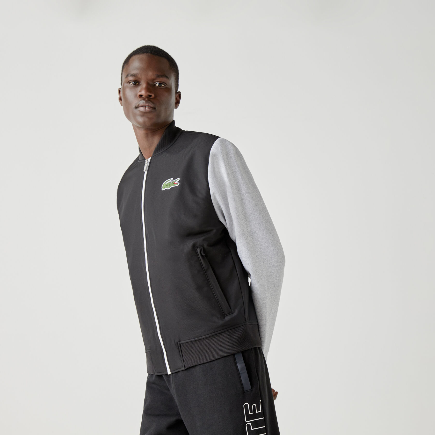 لاكوست جاكيت تيدي بسحاب من الصوف مع طبعة ثنائية اللون للرجال من مجموعة lacoste sport