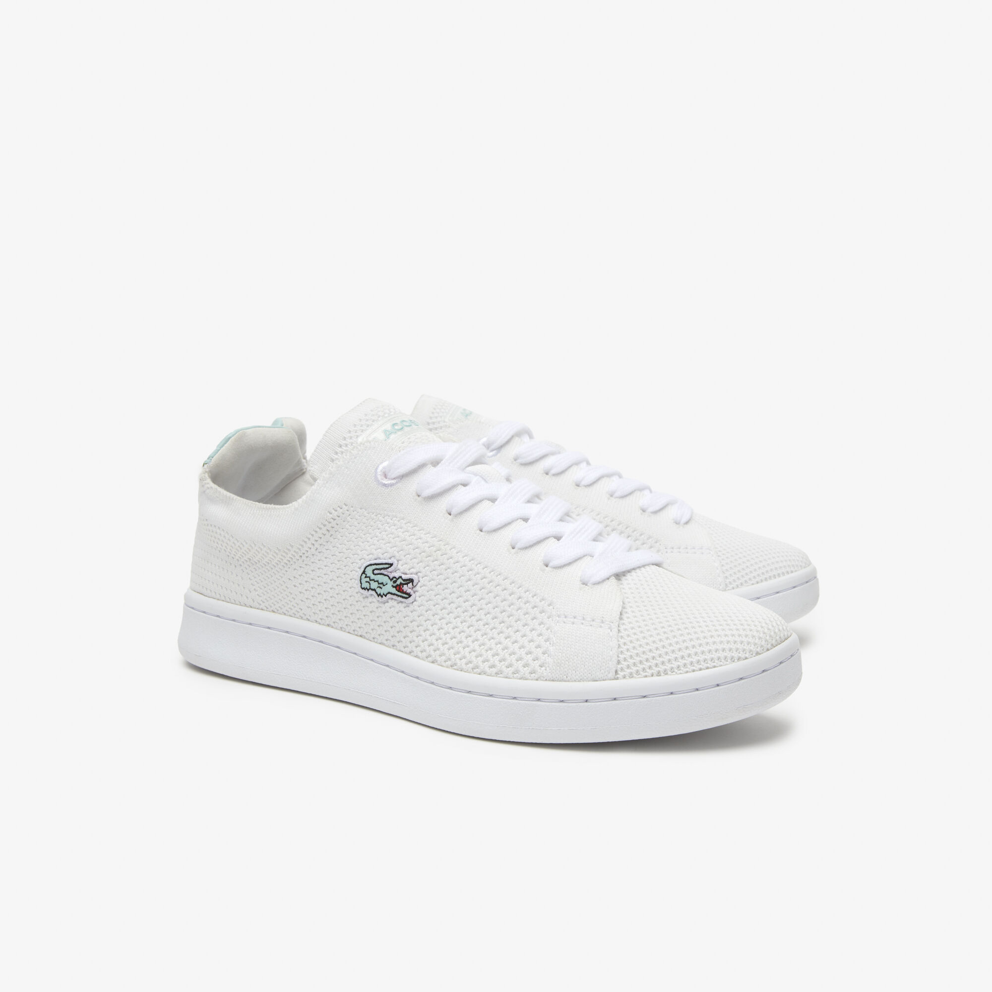 Buy Women s Lacoste Carnaby Pique Textile Heel Pop Trainers
