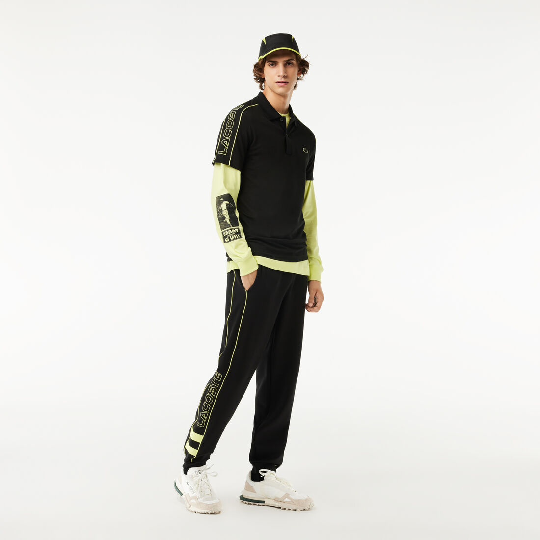 تي شيرت بولو بيكيه مطاطي مقسم بألوان بقَصّة عادية تي شيرت بولو بيكيه مطاطي مقسم بألوان بقَصّة عادية