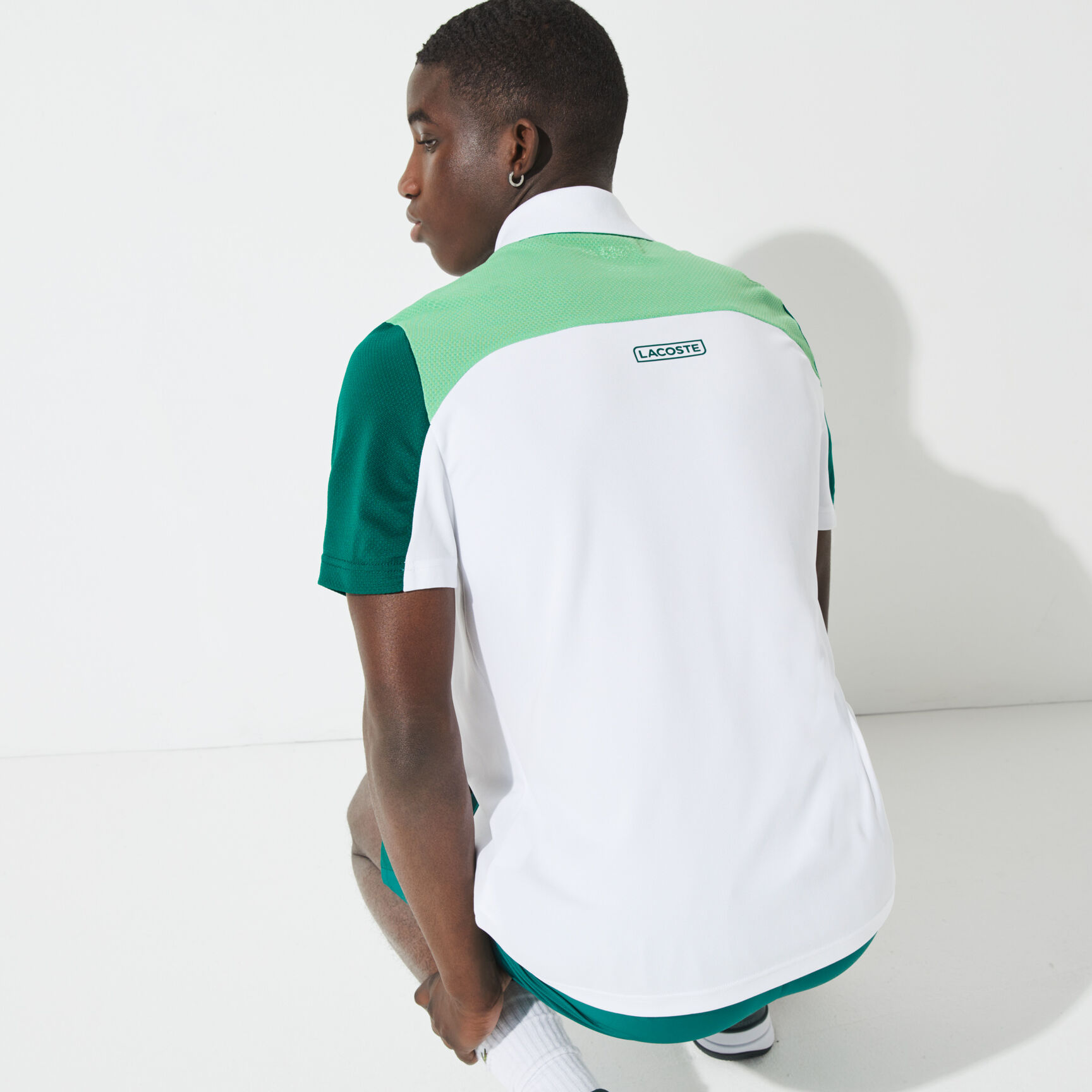 قميص بولو مسامي للتنس للرجال مع كتل لونية مجموعة Lacoste SPORT قميص بولو مسامي للتنس للرجال مع كتل لونية مجموعة Lacoste SPORT