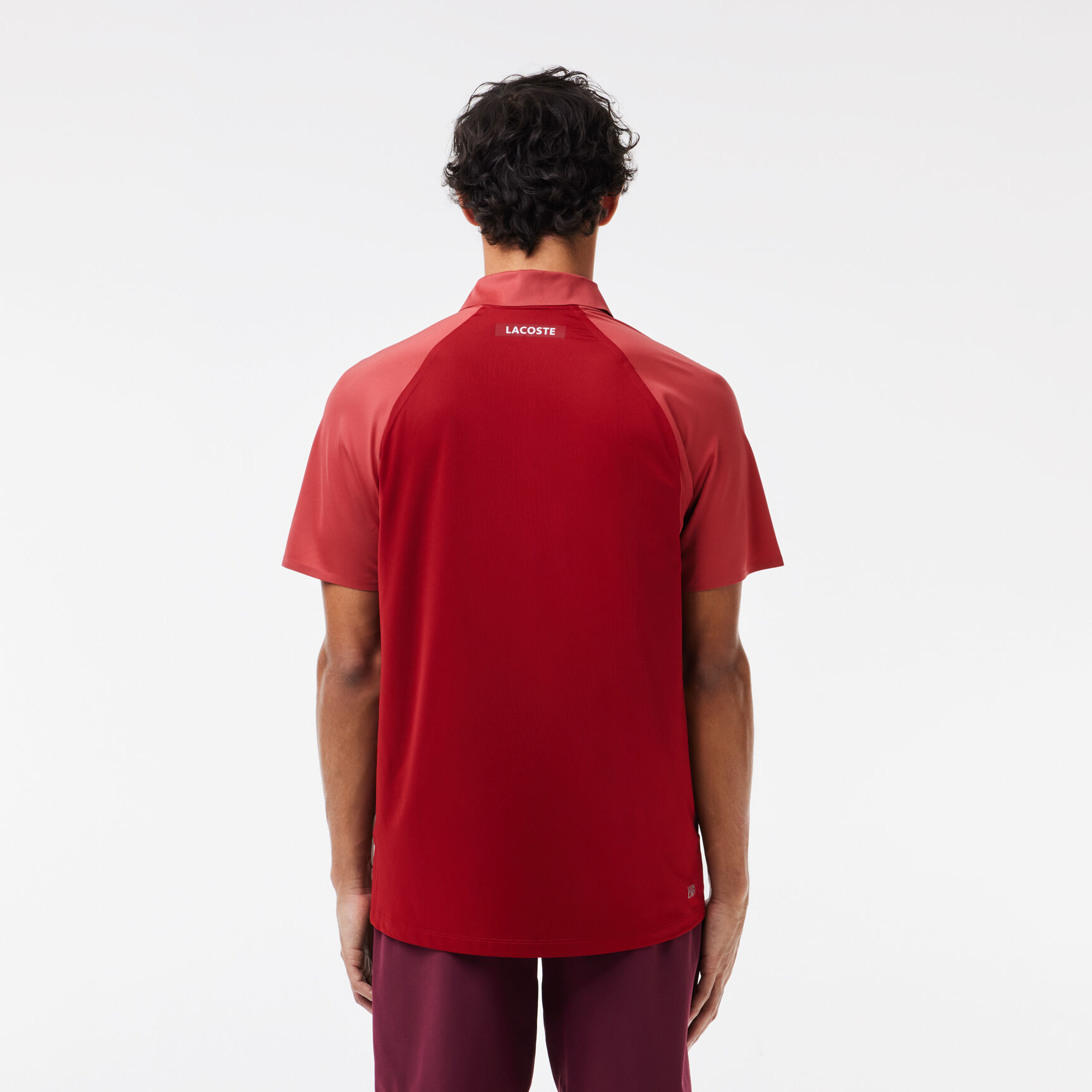 قميص بولو للتنس من لاكوست &times; نوفاك ديوكوفيتش فائق الجفاف