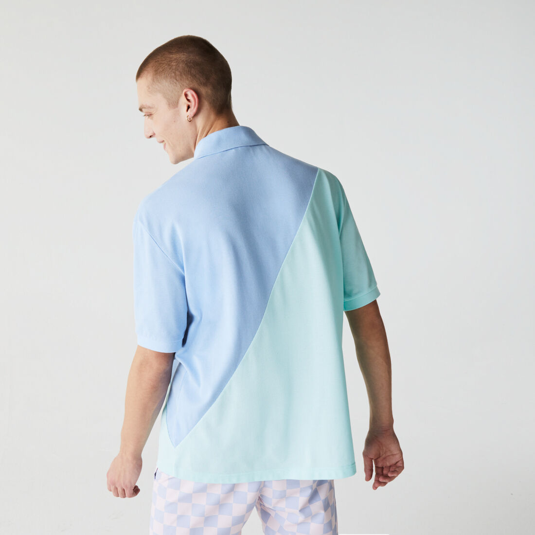 قميص بولو بيكيه القطن للجنسين بقصة فضفاضة وكتل لونية مجموعة Lacoste LIVE قميص بولو بيكيه القطن للجنسين بقصة فضفاضة وكتل لونية مجموعة Lacoste LIVE