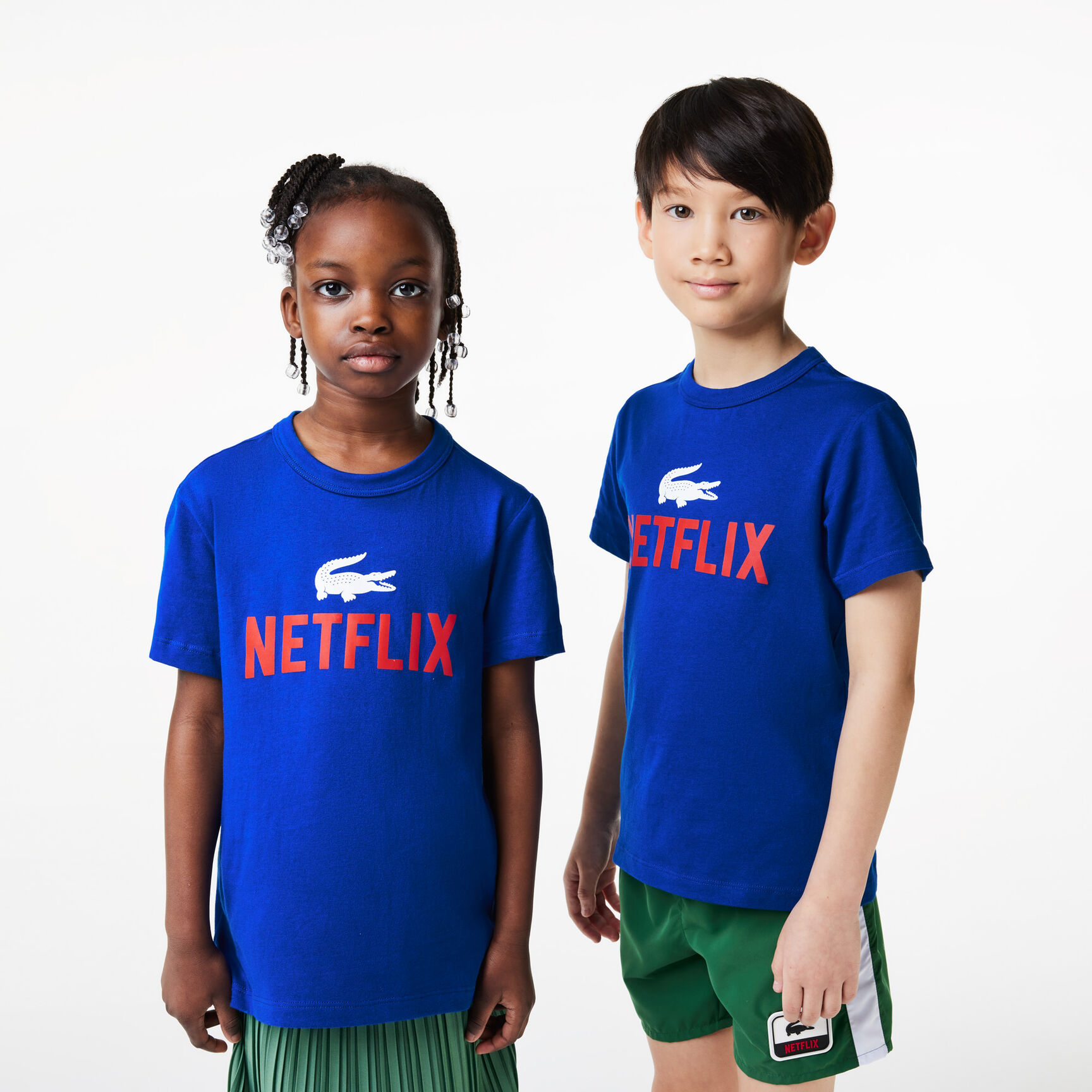 تيشيرت بطبعة قطن عضوي للأطفال مجموعة Lacoste x Netflix تيشيرت بطبعة قطن عضوي للأطفال مجموعة Lacoste x Netflix