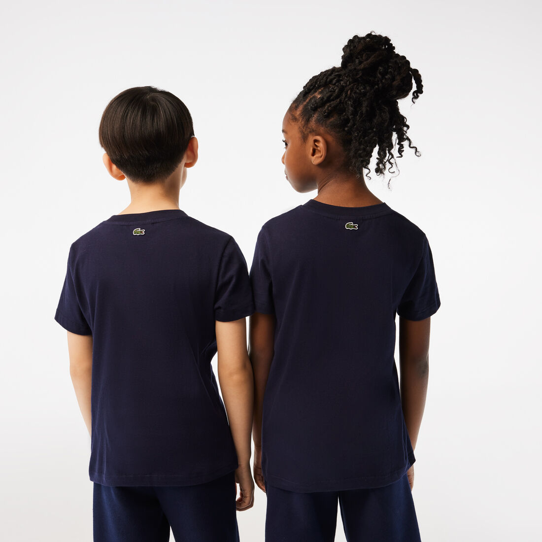 تيشيرت لاكوست قطن جيرسيه بشعار الماركة بلون مغاير للأطفال تيشيرت لاكوست قطن جيرسيه بشعار الماركة بلون مغاير للأطفال