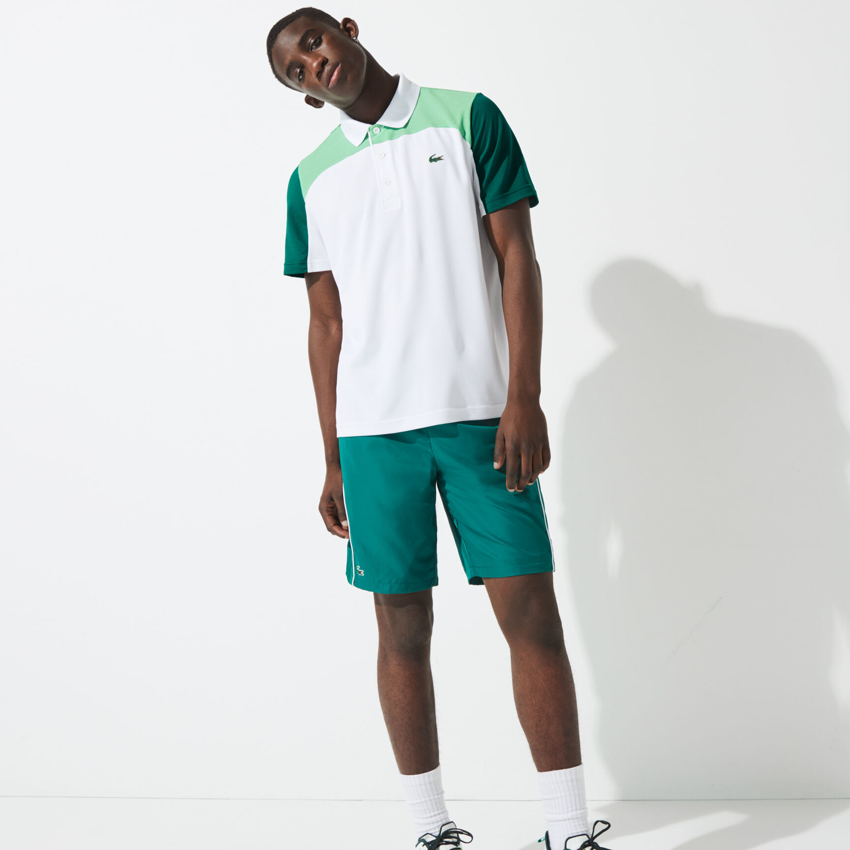 قميص بولو مسامي للتنس للرجال مع كتل لونية مجموعة Lacoste SPORT قميص بولو مسامي للتنس للرجال مع كتل لونية مجموعة Lacoste SPORT