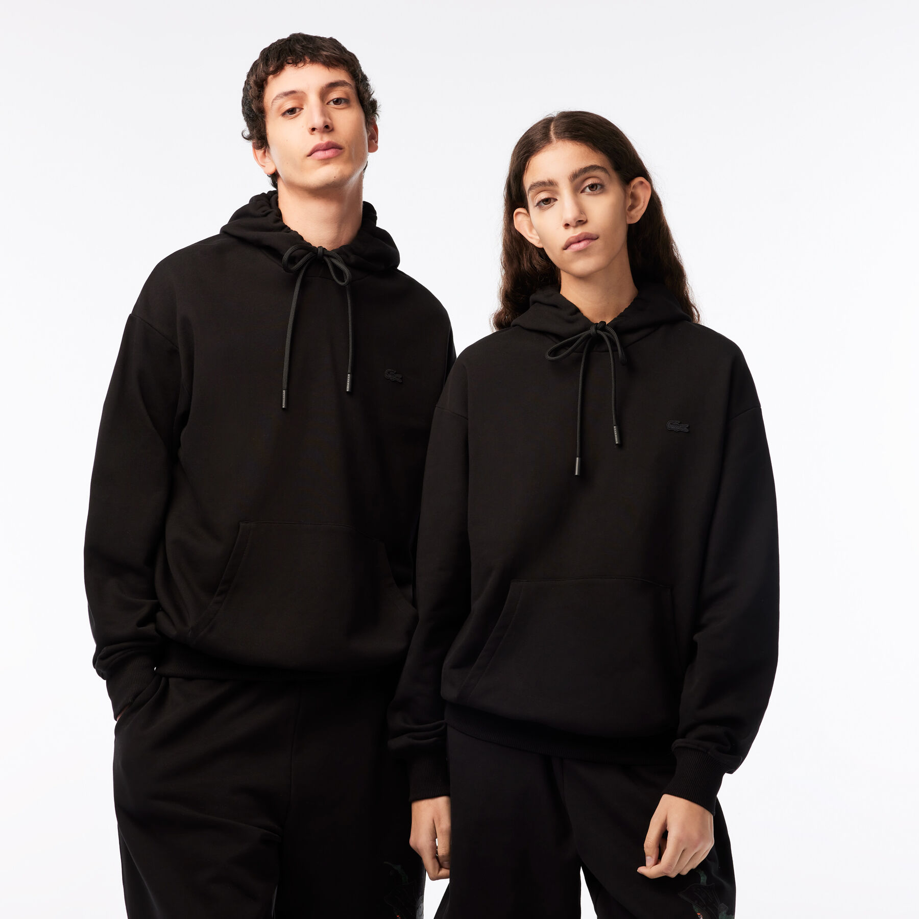 هودي بقصة فضفاضة للجنسين مجموعة Lacoste x Netflix لاكوست هودي بقصة فضفاضة للجنسين مجموعة lacoste x netflix