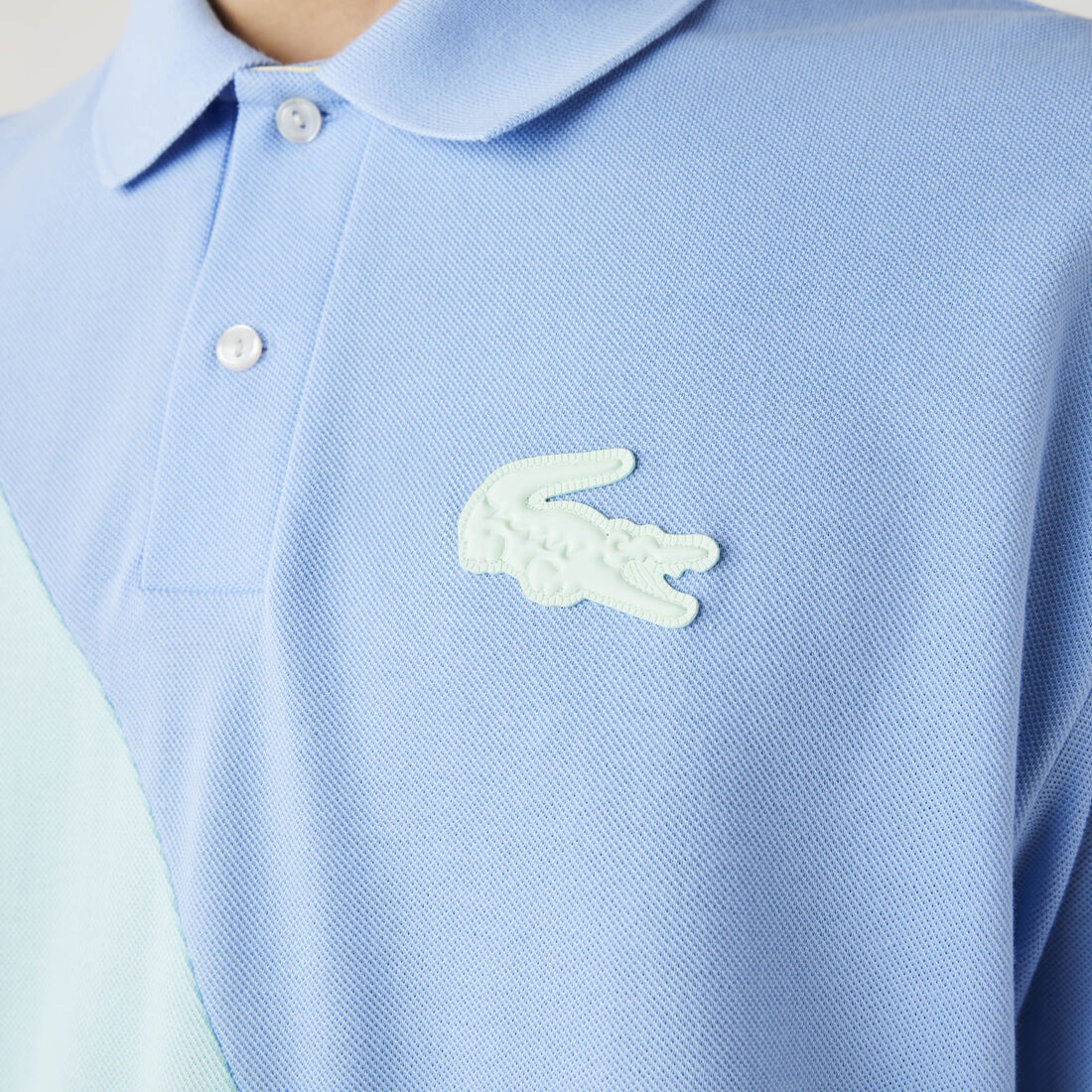 قميص بولو بيكيه القطن للجنسين بقصة فضفاضة وكتل لونية مجموعة Lacoste LIVE قميص بولو بيكيه القطن للجنسين بقصة فضفاضة وكتل لونية مجموعة Lacoste LIVE