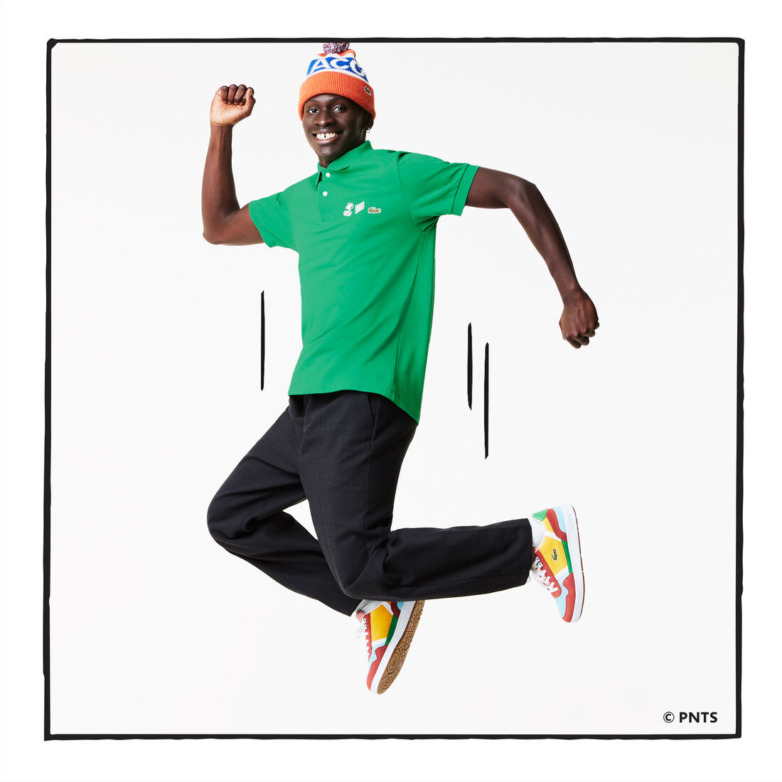 قميص بولو من القطن العضوي الرجالي من مجموعة Lacoste x Peanuts