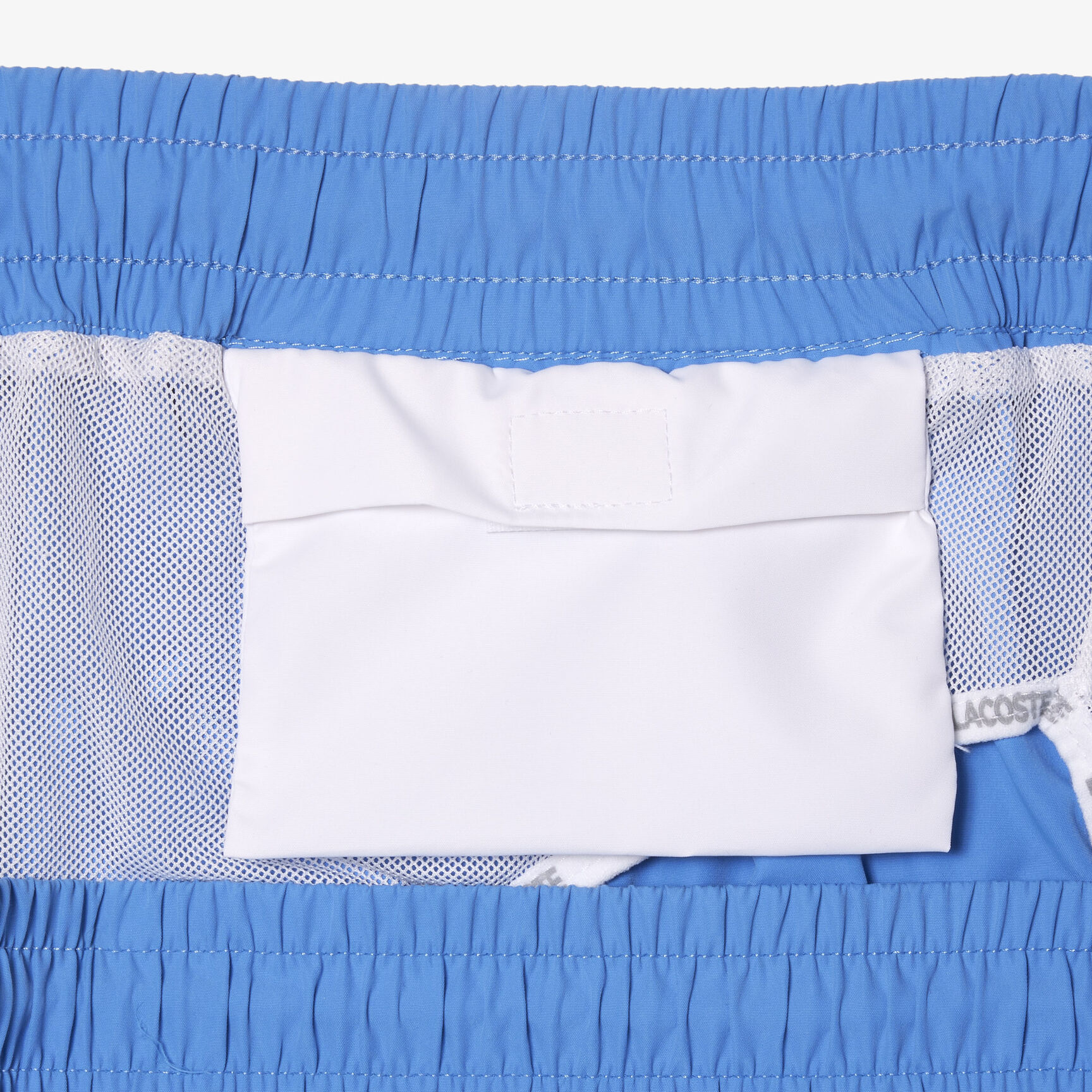 شورت سباحة لاكوست سريع الجفاف ببطانة مدمجة للرجال