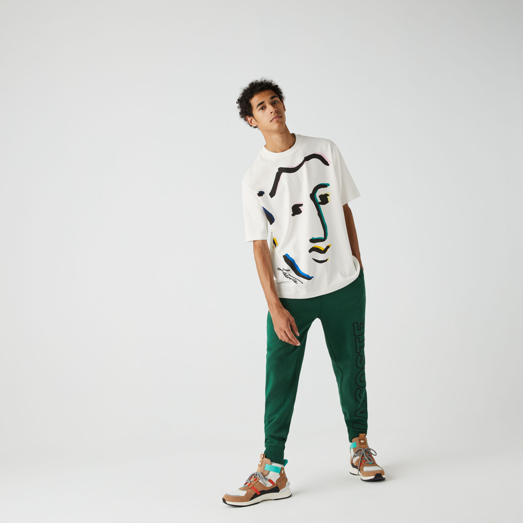 تي شيرت قطن مع طبعة وجه مميزة من مجموعة Lacoste LIVE للجنسين تي شيرت قطن مع طبعة وجه مميزة من مجموعة Lacoste LIVE للجنسين