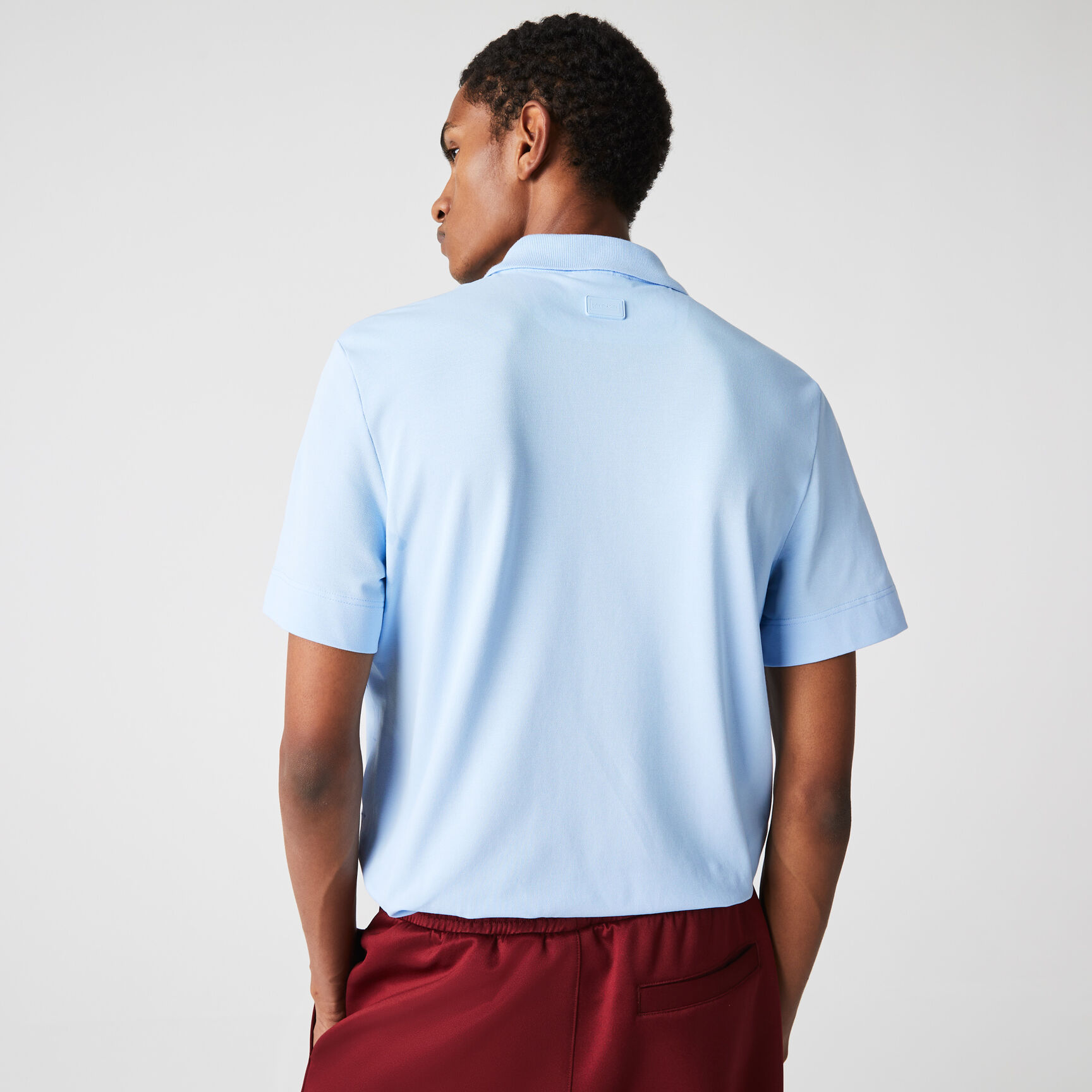 بولو بيكيه الخفيف المسامي للرجال من Lacoste