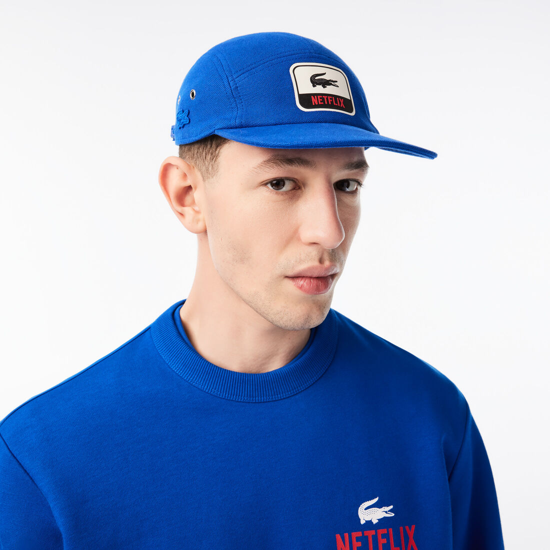 كاب قطن عضوي للرجال مجموعة Lacoste x Netflix‎‎