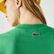 لاكوست تي شيرت قطني للجنسين قصة فضفاضة وتطريز ذهبي مجموعة lacoste live