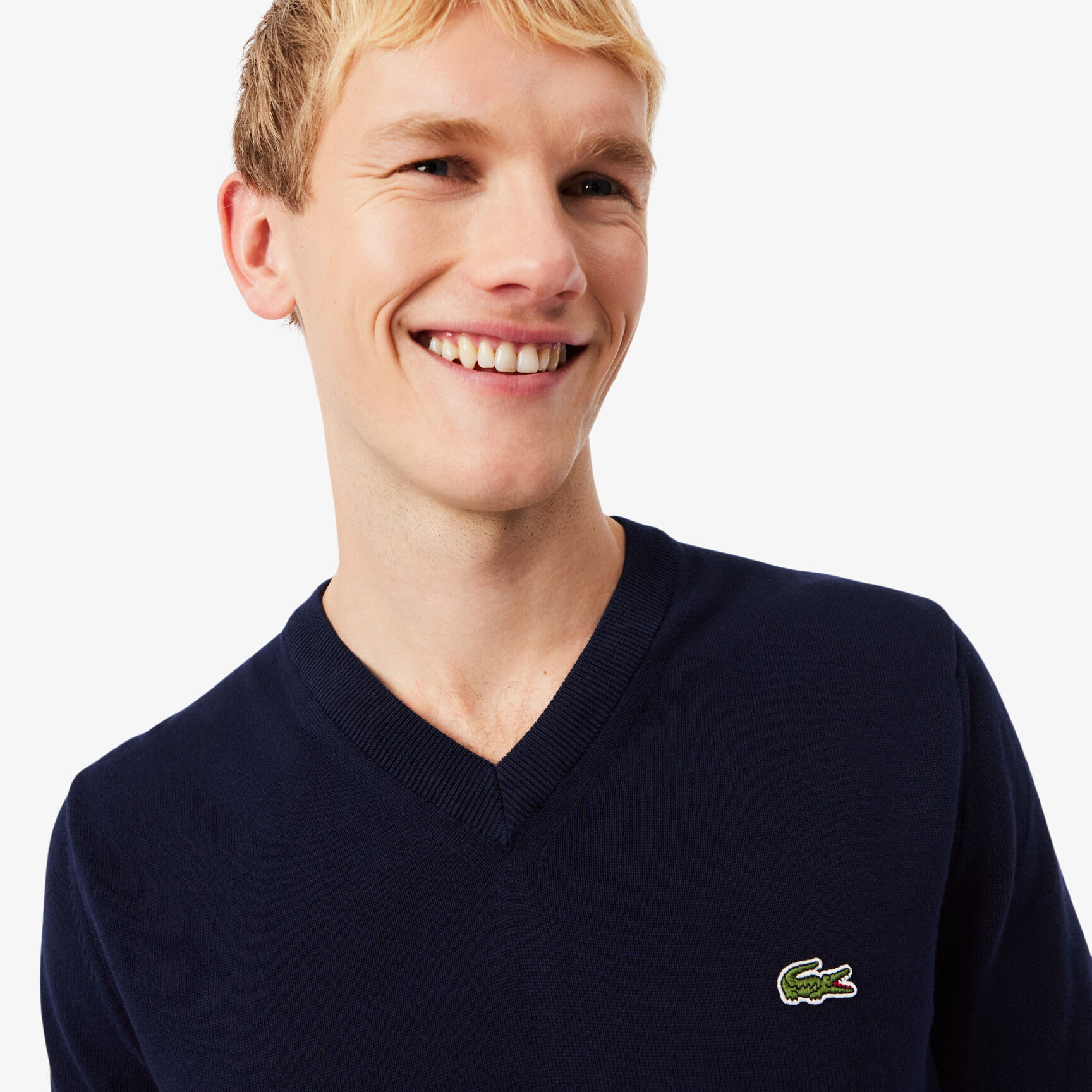 سترة قطنية أحادية اللون بفتحة رقبة على شكل حرف V