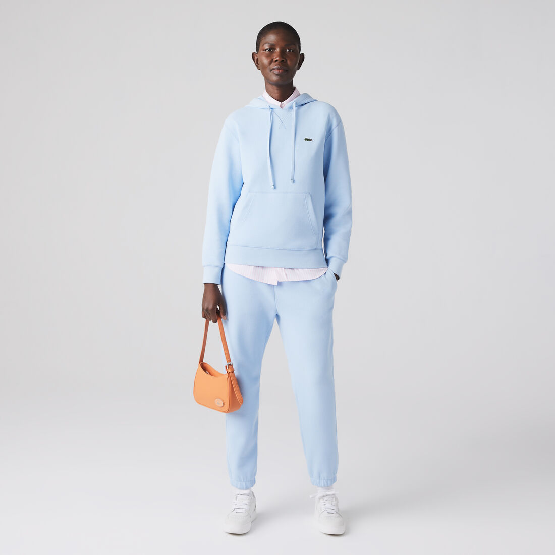 حقيبة لاكوست بتصميم مستطيل مزين بحلية معدنية جلد بارز الملمس للنساء حقيبة لاكوست بتصميم مستطيل مزين بحلية معدنية جلد بارز الملمس للنساء