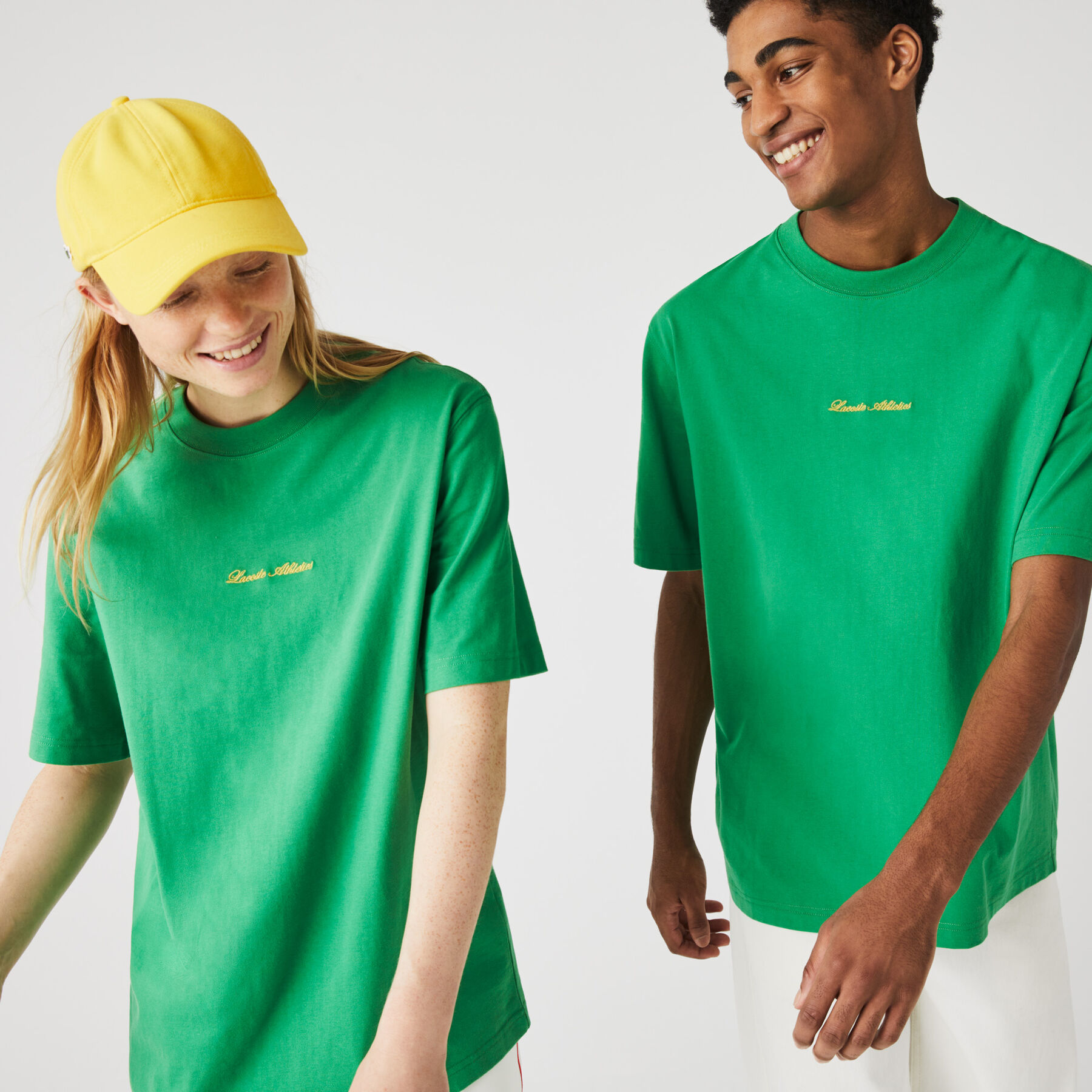 لاكوست تي شيرت قطني للجنسين قصة فضفاضة وتطريز ذهبي مجموعة lacoste live