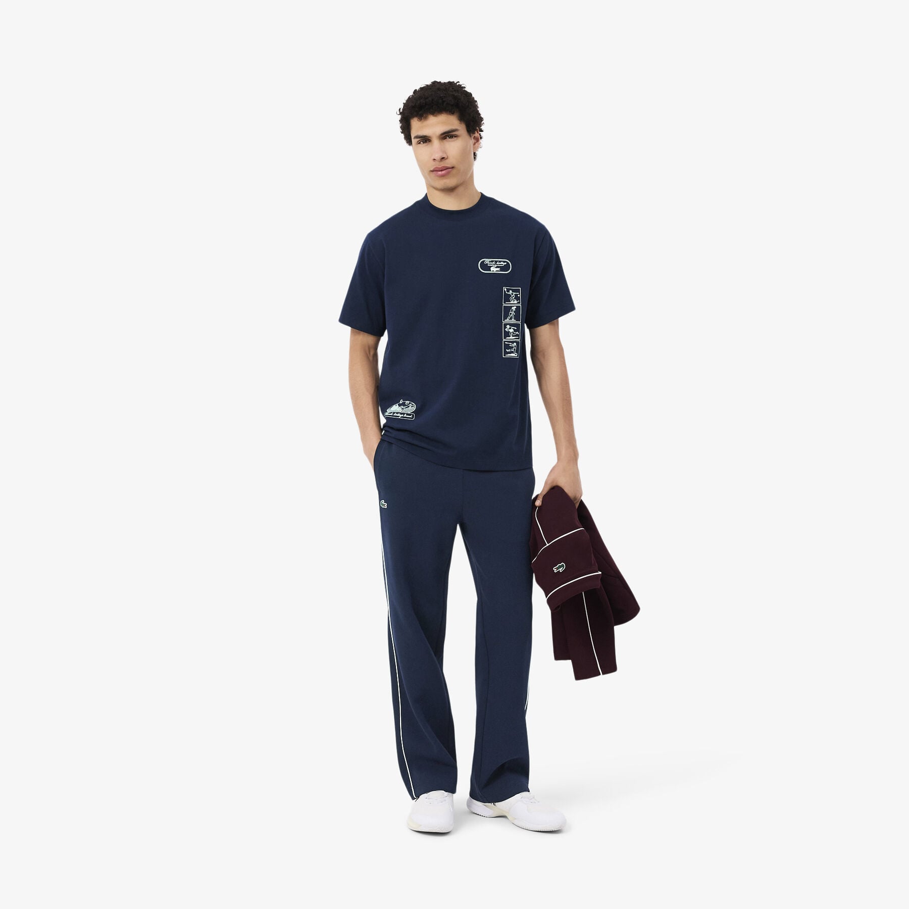 لاكوست بنطال رياضي بتصميم تراث التنس
