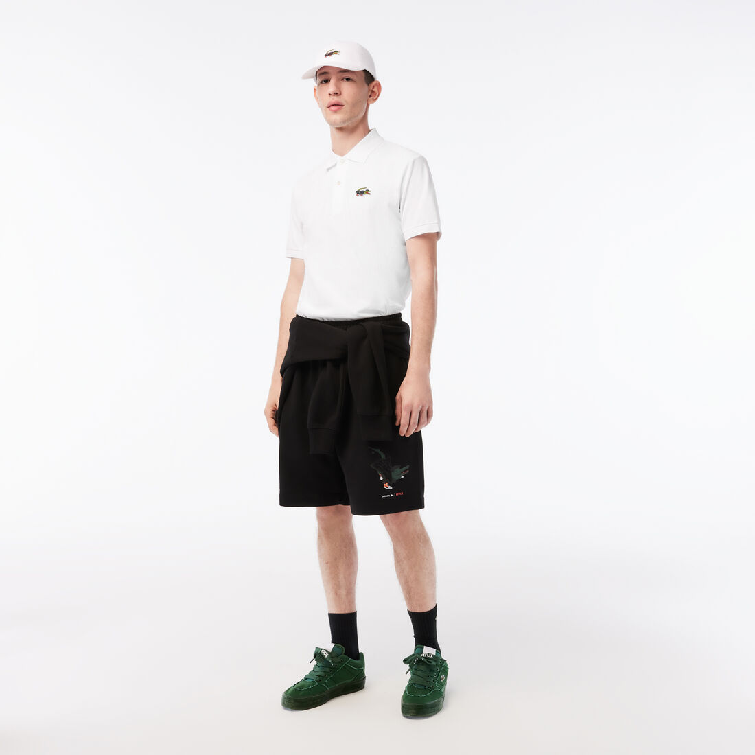 تيشيرت بولو قطن عضوي للرجال مجموعة Lacoste x Netflix تيشيرت بولو قطن عضوي للرجال مجموعة Lacoste x Netflix